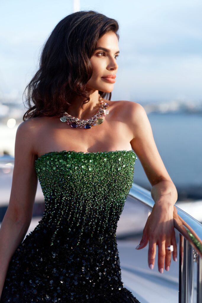 Fashion influencer Victoria Barbara style at 2022 Cannes Film Festival Elvis premiere wearing Tony Ward Couture & Bvlgari jewelry with makeup by Jonathan Sanchez