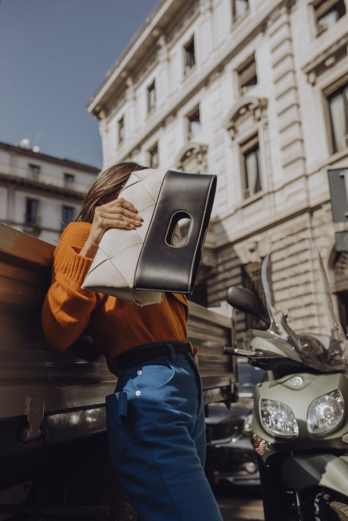 Victoria Barbara holding Bottega Veneta Slip Tote