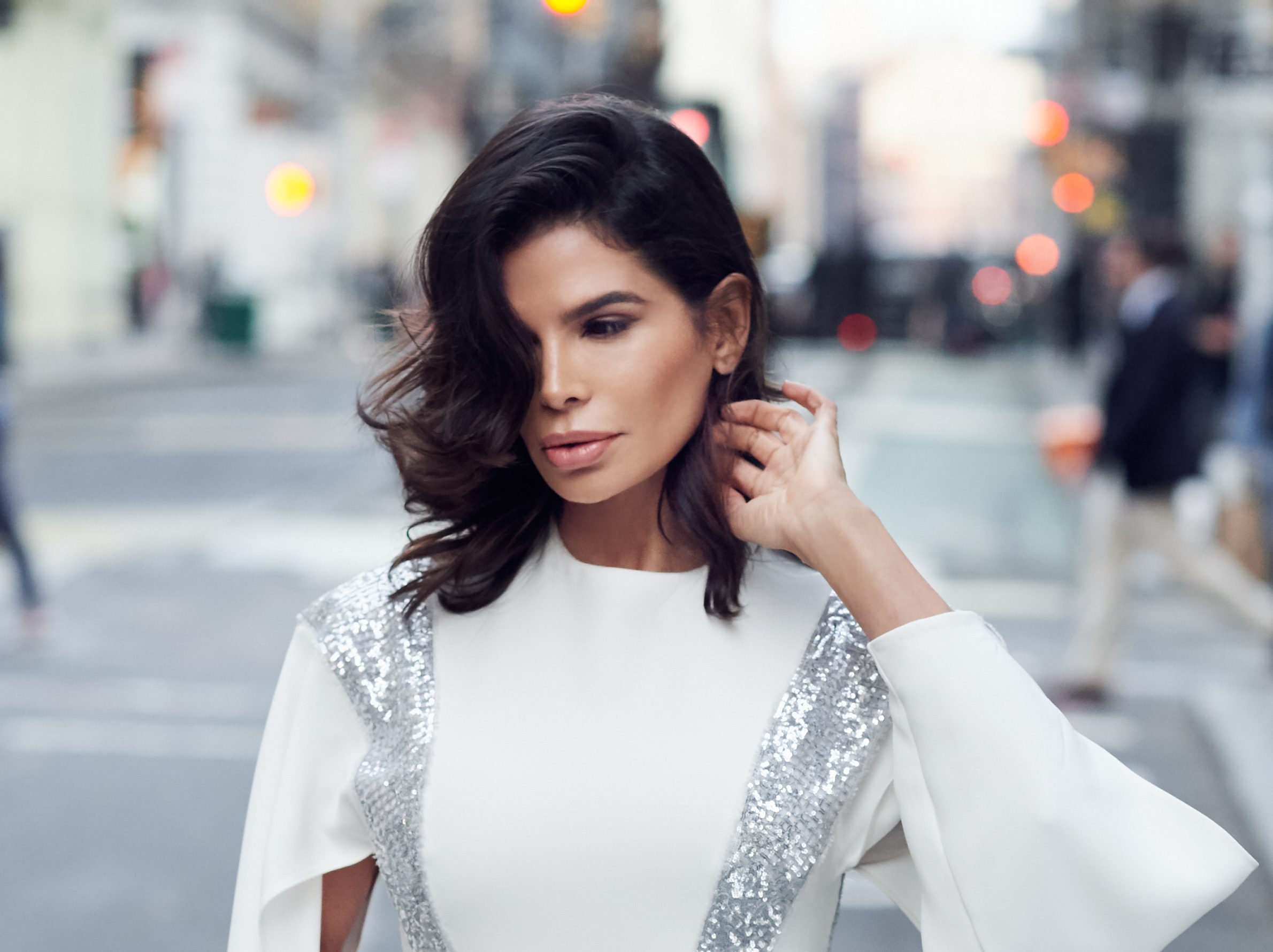 Victoria Barbara in White Louis Vuitton Evening Dress