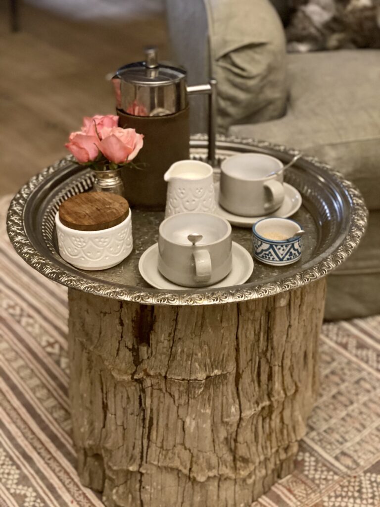 Safari lodge breakfast tray with coffee pastries and fruit Kenya luxury travel