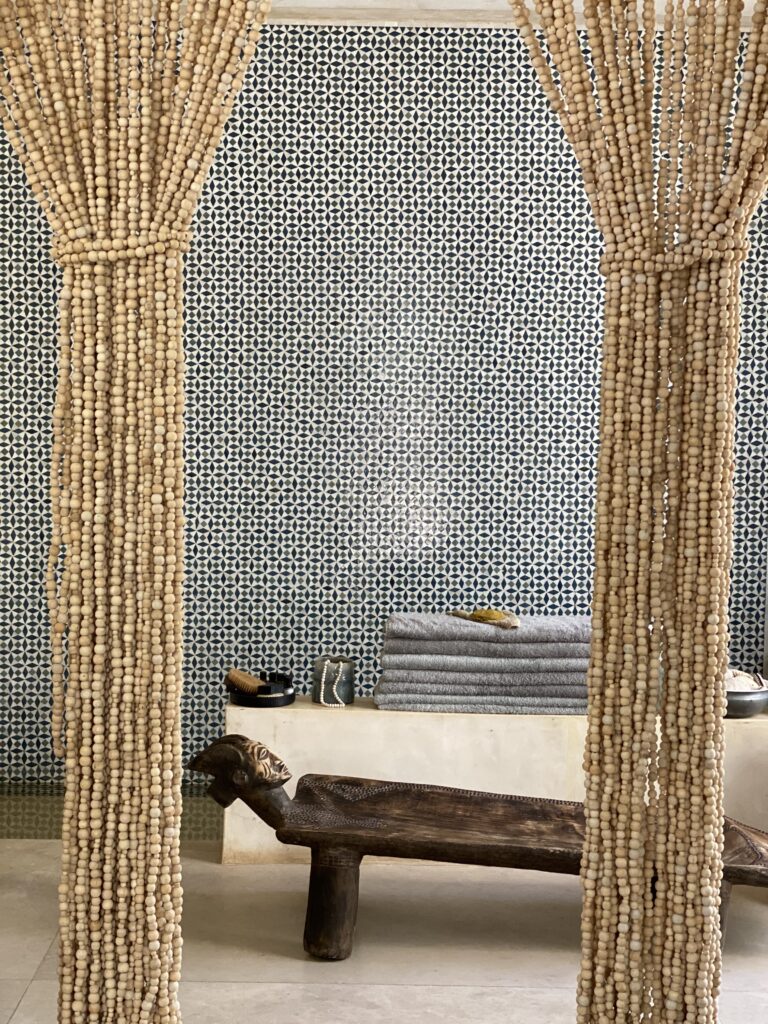 Arijiju spa interior with beaded curtains neutral tones Kenya