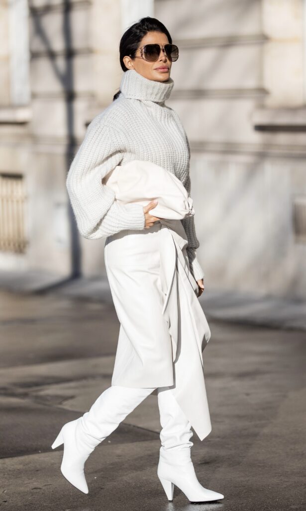 Victoria Barbara walking in neutral monochrome outfit en route to Isabel Marant show during Paris Fashion Week