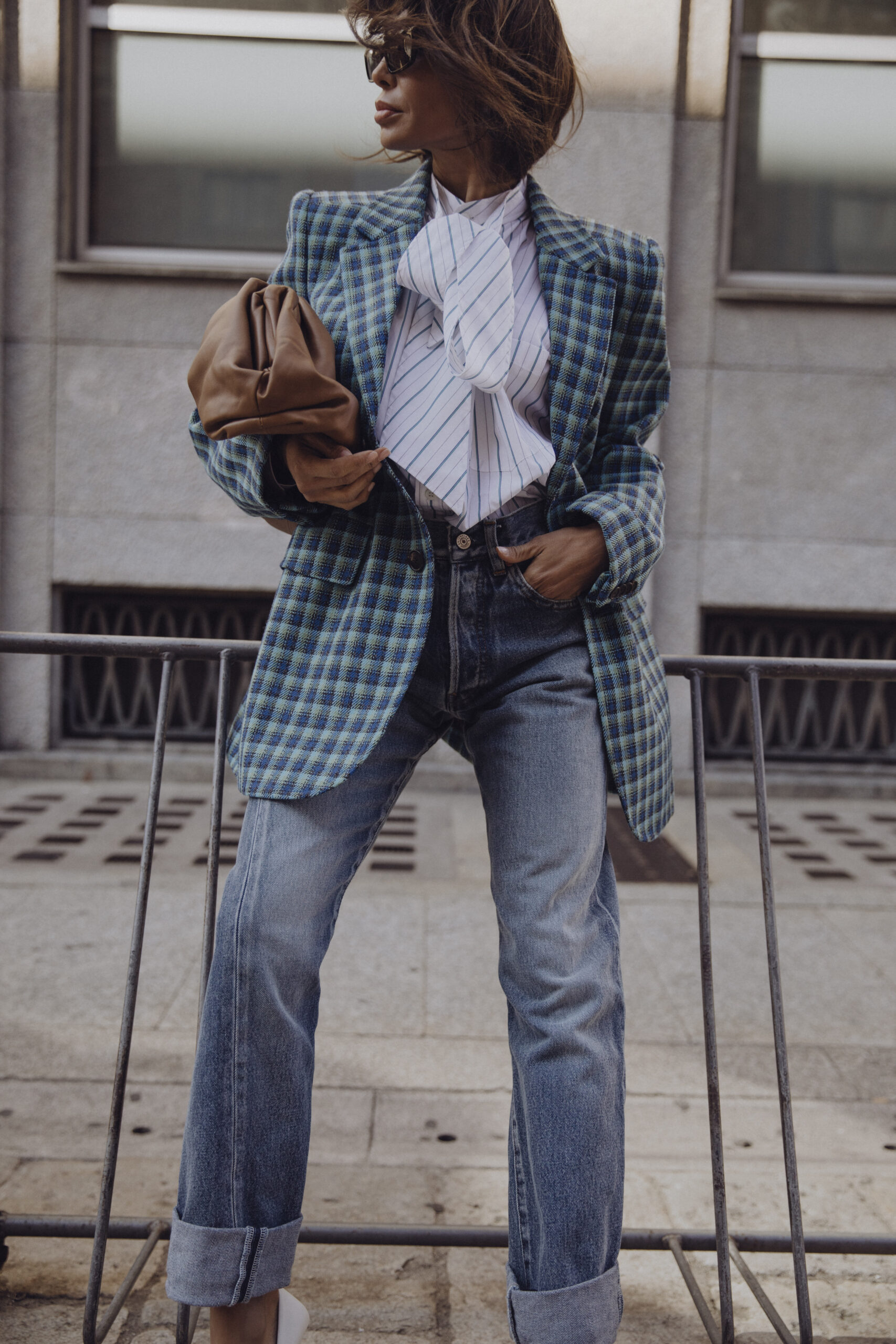 Balenciaga outfit with Bottega Veneta clutch and structured blazer styling