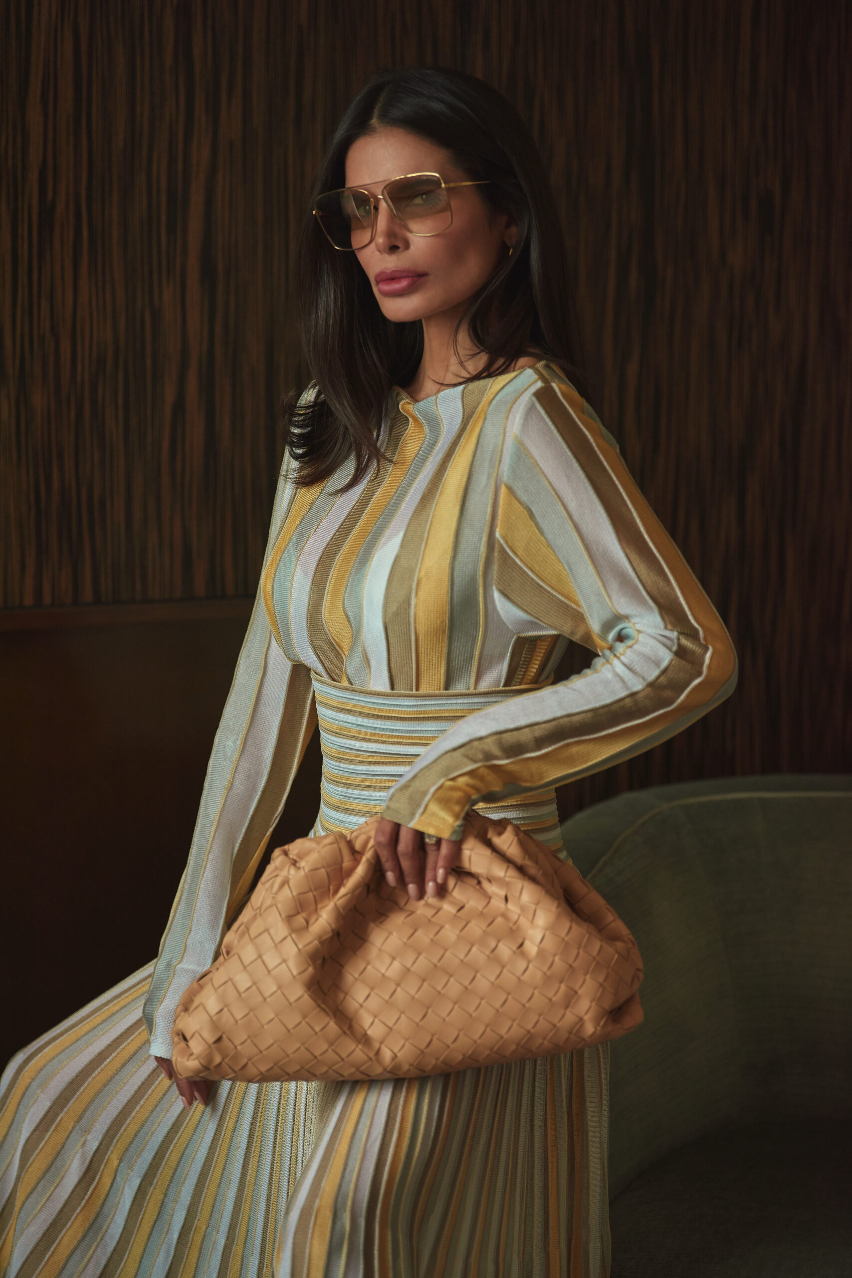 Bevza look styled with Bottega Veneta pouch and Tom Ford sunglasses detail