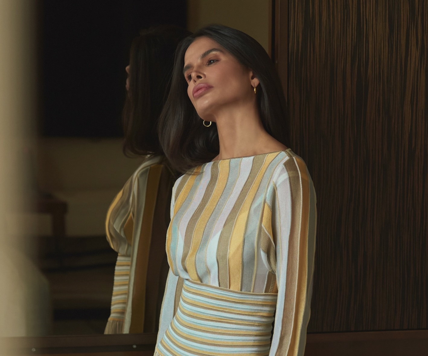 Close portrait of Bevza look highlighting neckline, fabric texture, and soft composition