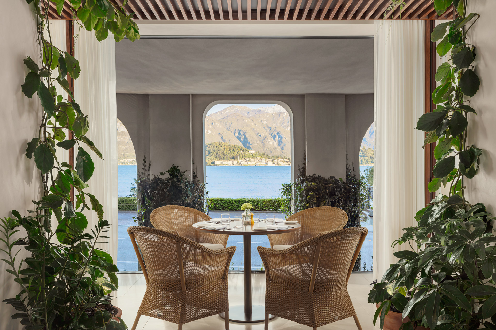 Outdoor terrace dining at The Lake Como EDITION overlooking Lake Como