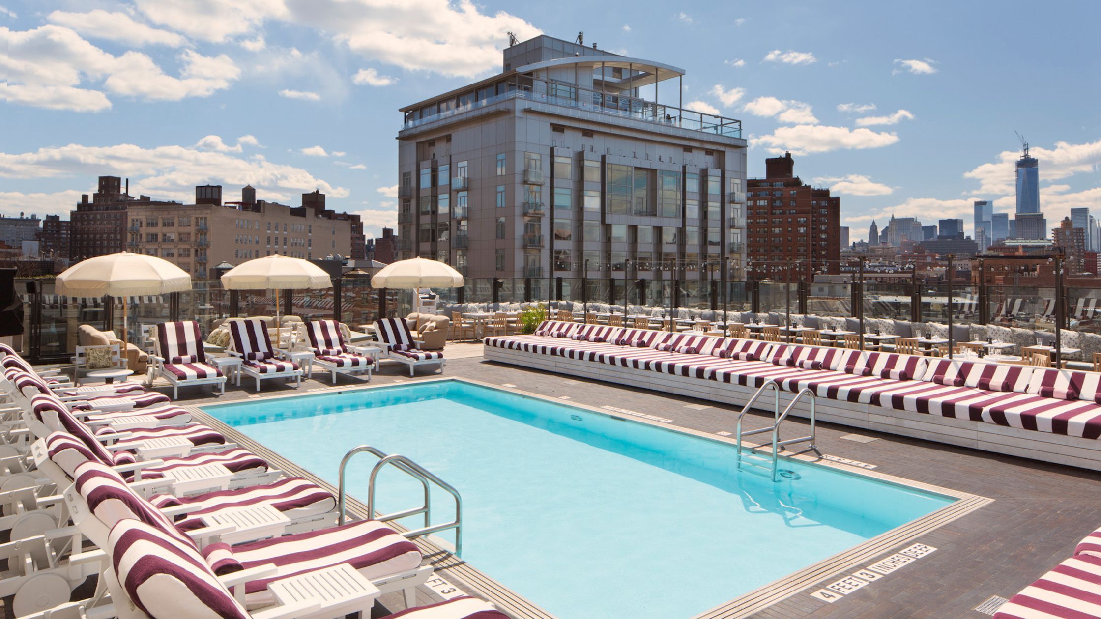 Soho House New York rooftop pool overlooking Manhattan skyline