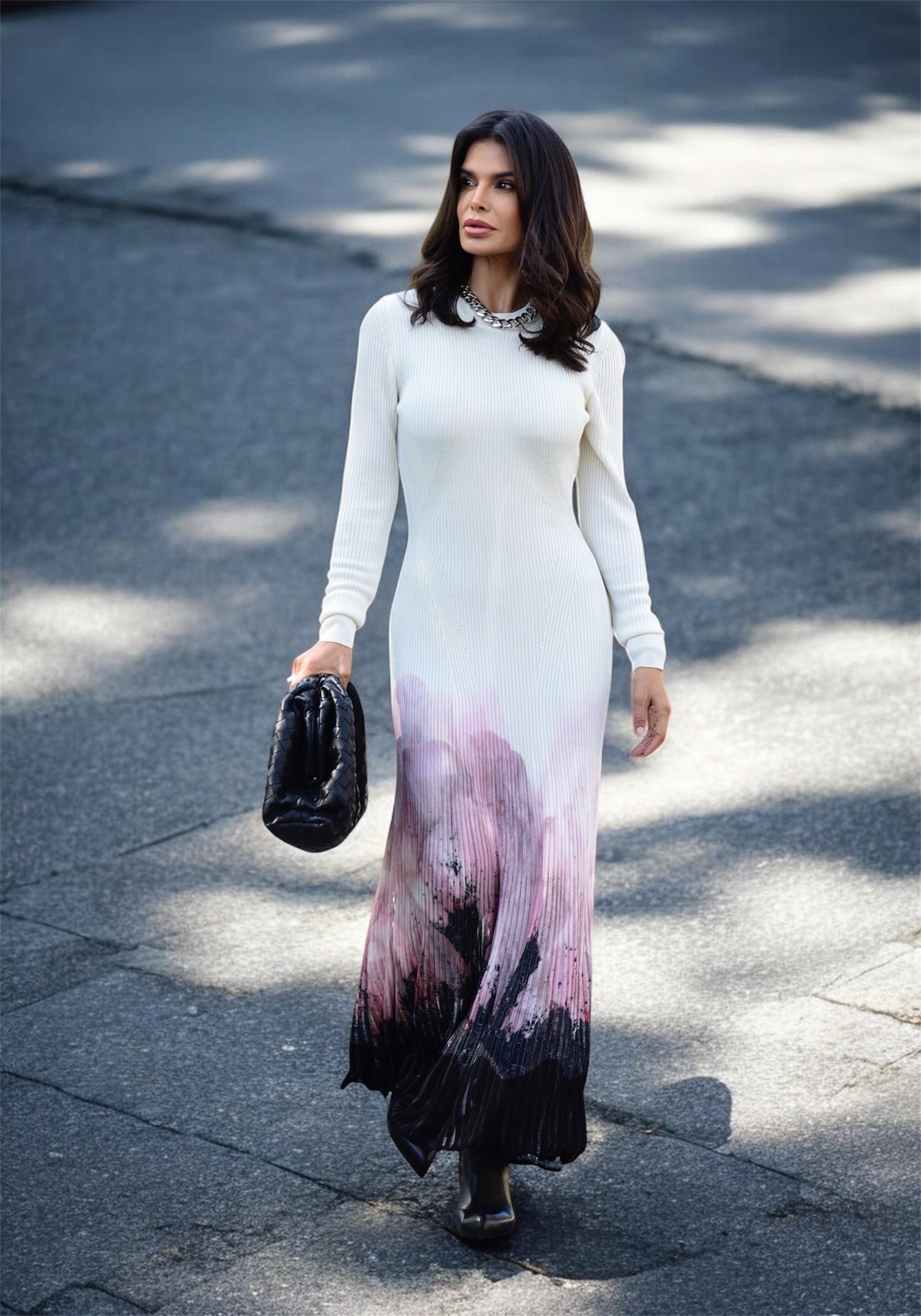 Victoria Barbara wearing Alexander McQueen long sleeve knit dress with Bottega Veneta clutch and Fendi boots in Los Angeles