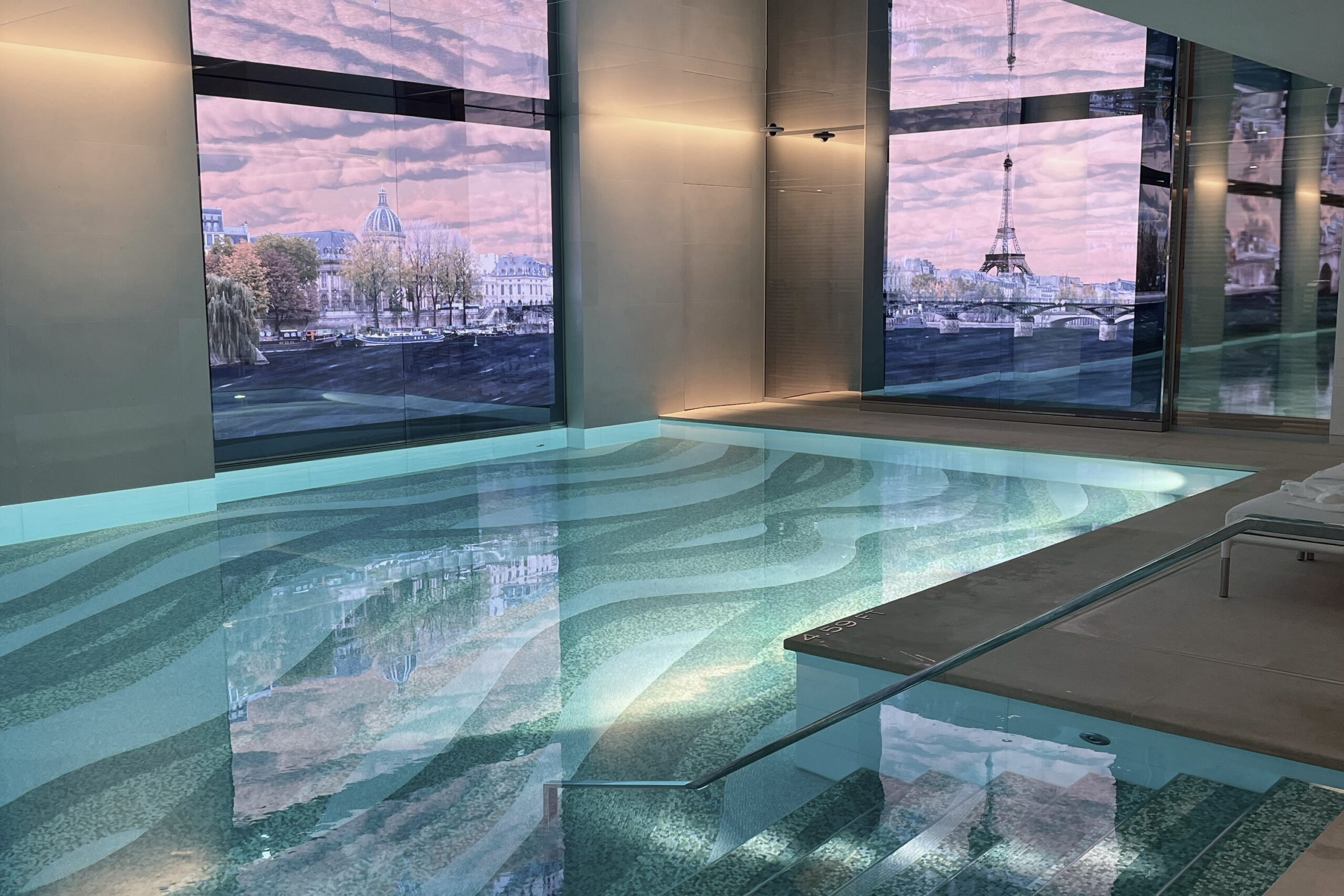 Spa pool at Cheval Blanc Paris with soft lighting and marble interior