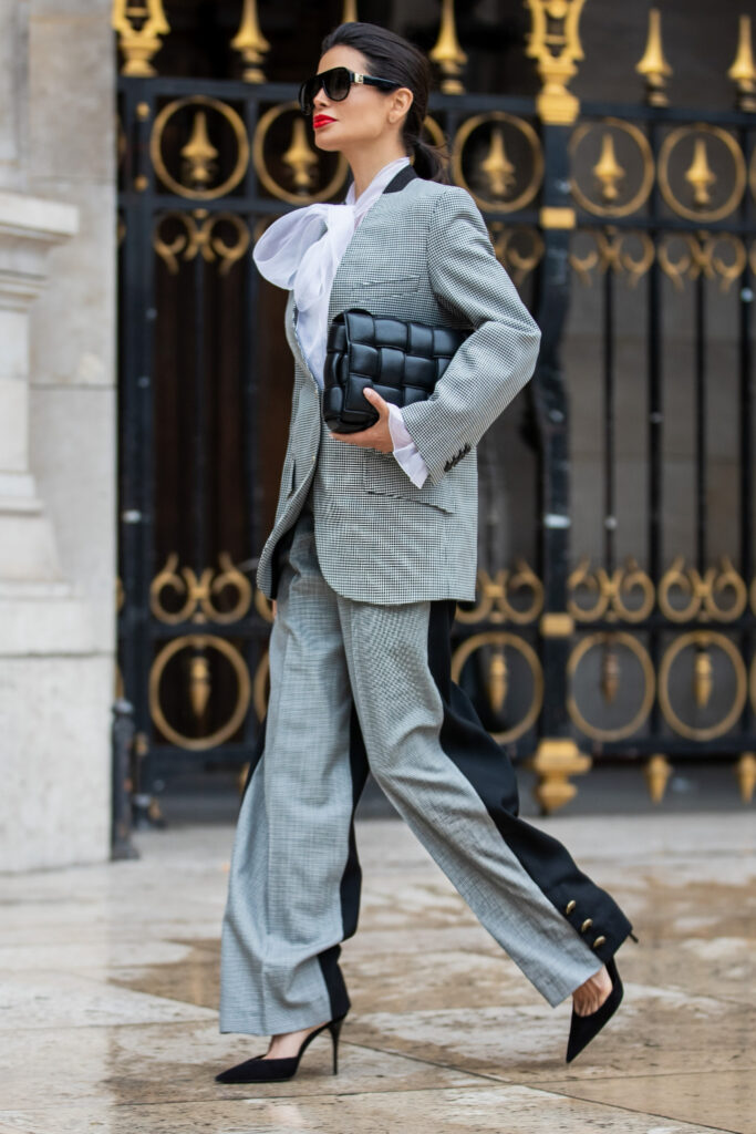 Victoria Barbara arriving at Givenchy show in Paris wearing full Givenchy tailored suit and sunglasses