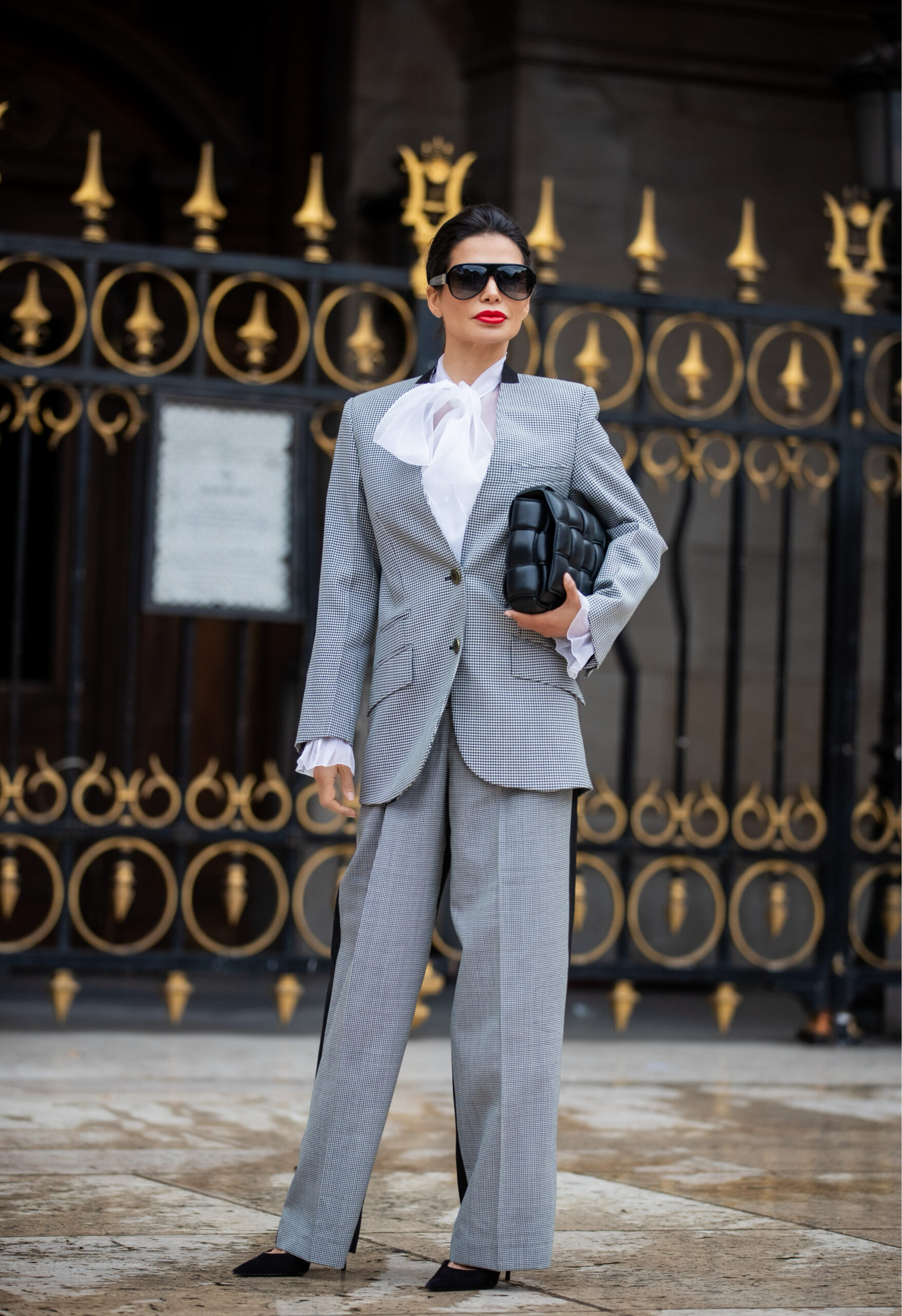 Victoria Barbara wearing full Givenchy suit with wide leg trousers and heels at Givenchy show Paris