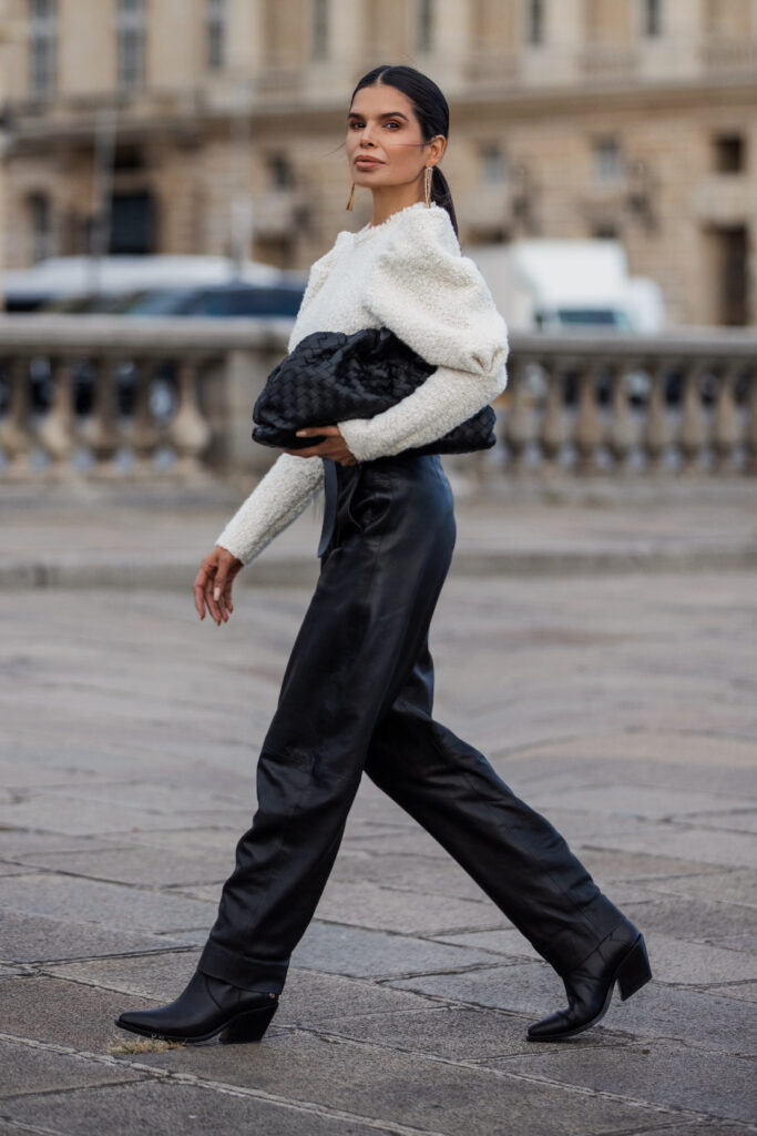 Victoria Barbara walking in Isabel Marant outfit styled with Bottega Veneta pouch during Paris Fashion Week