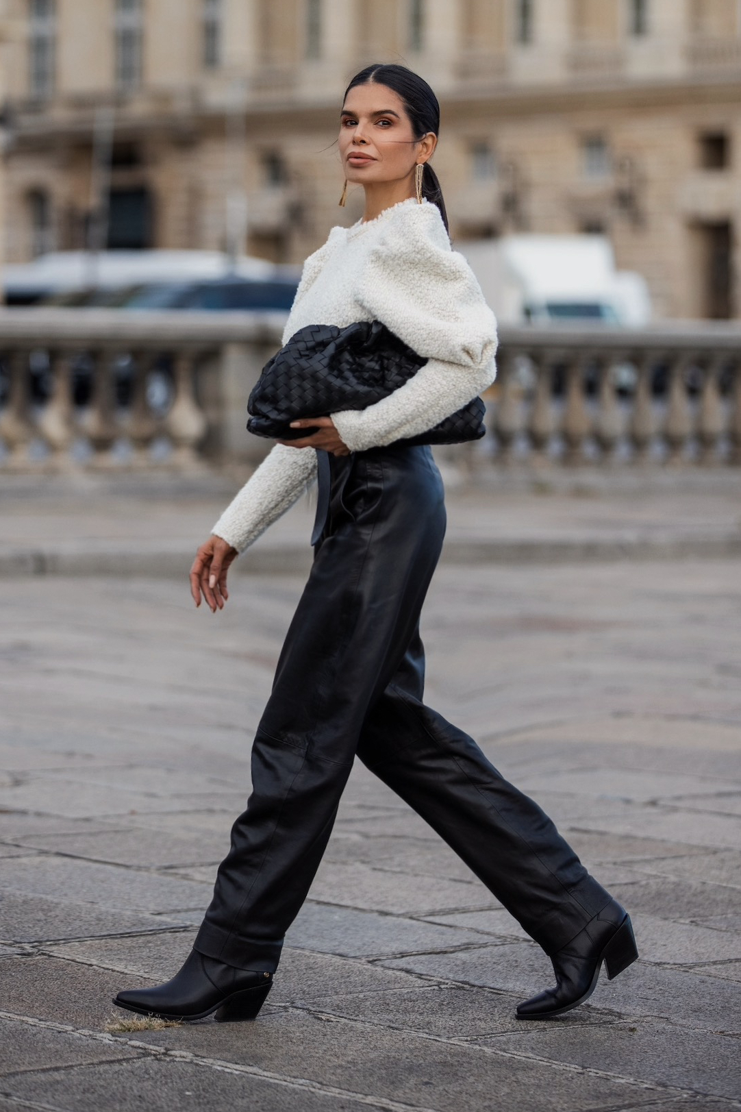 Victoria Barbara walking in Isabel Marant outfit styled with Bottega Veneta pouch during Paris Fashion Week