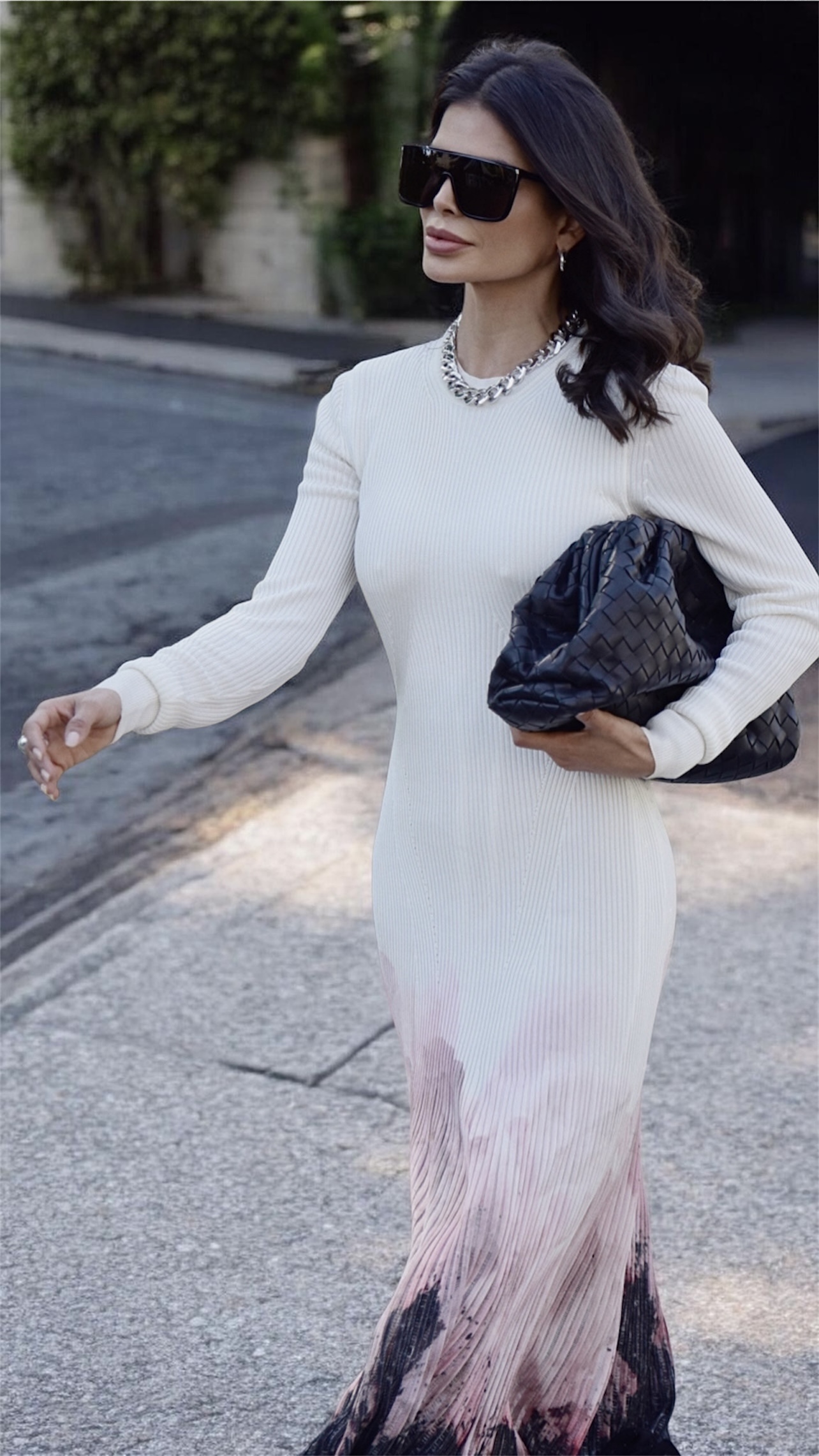 Victoria Barbara in flowing Alexander McQueen dress with Givenchy sunglasses and Bottega Veneta bag walking in Los Angeles