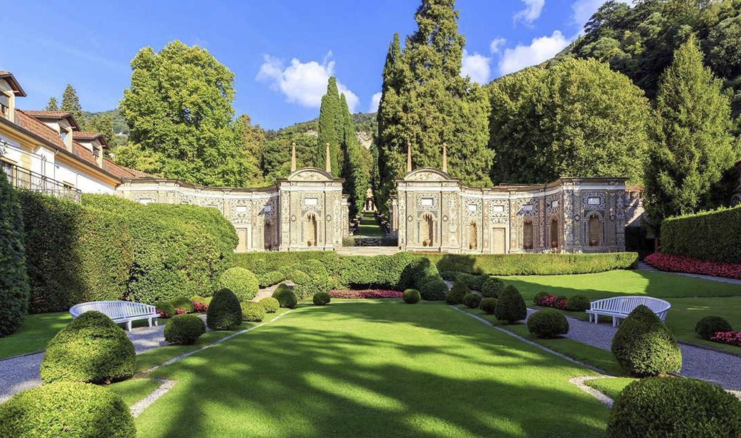Gardens at Villa d'Este Lake Como with manicured greenery and lakefront setting