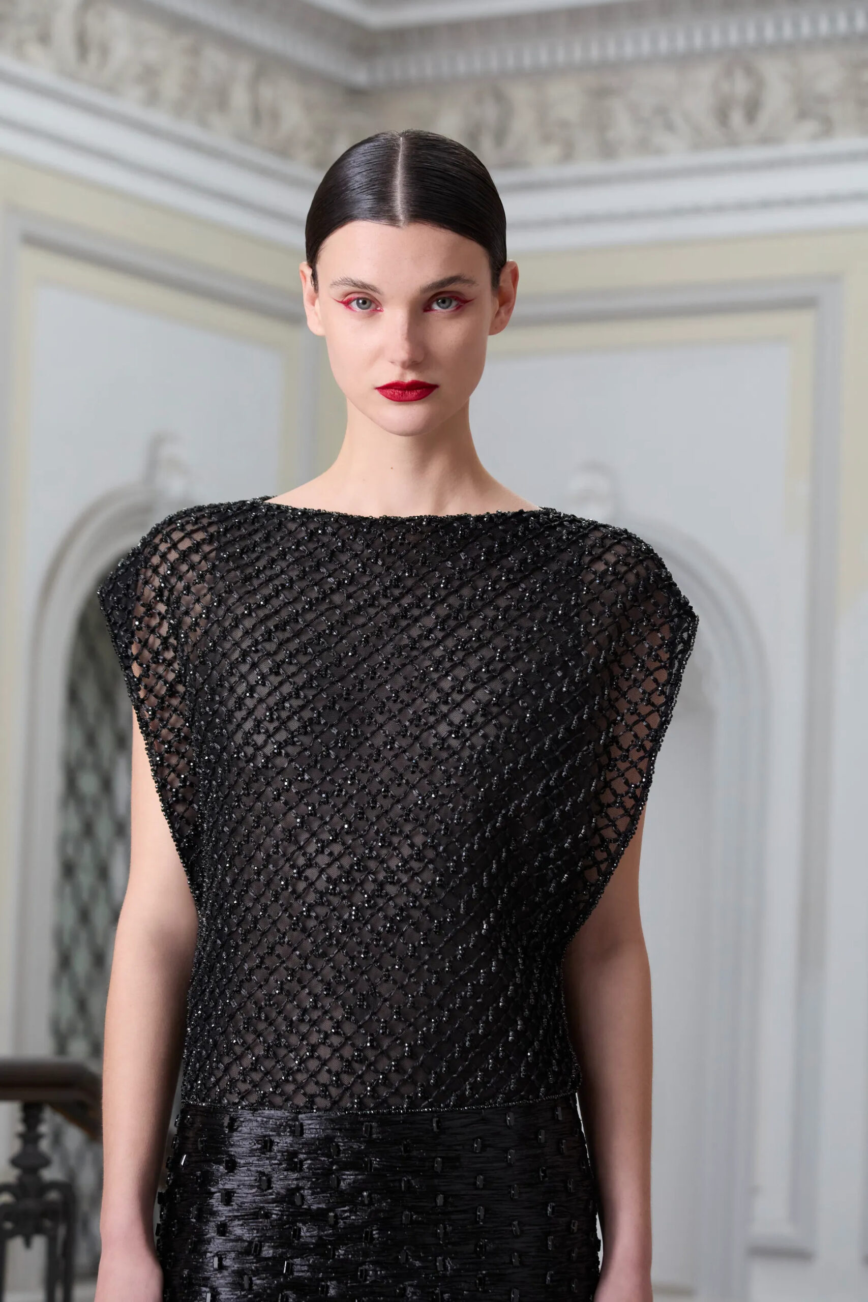 Close-up black lattice embroidery detail from Antonio Grimaldi Spring 2026 Couture