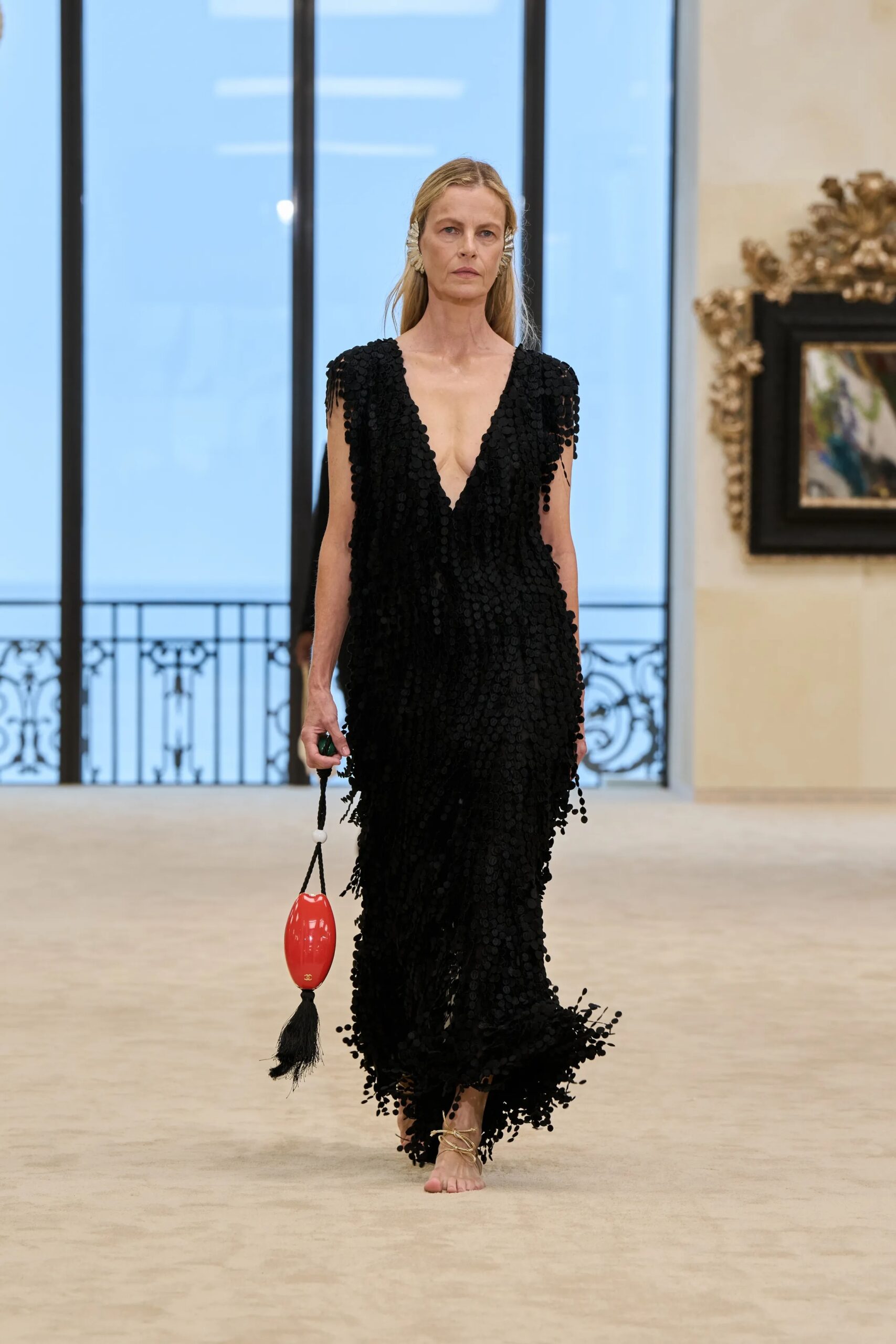 Chanel Cruise 2026/27 black deep V evening dress textured runway look