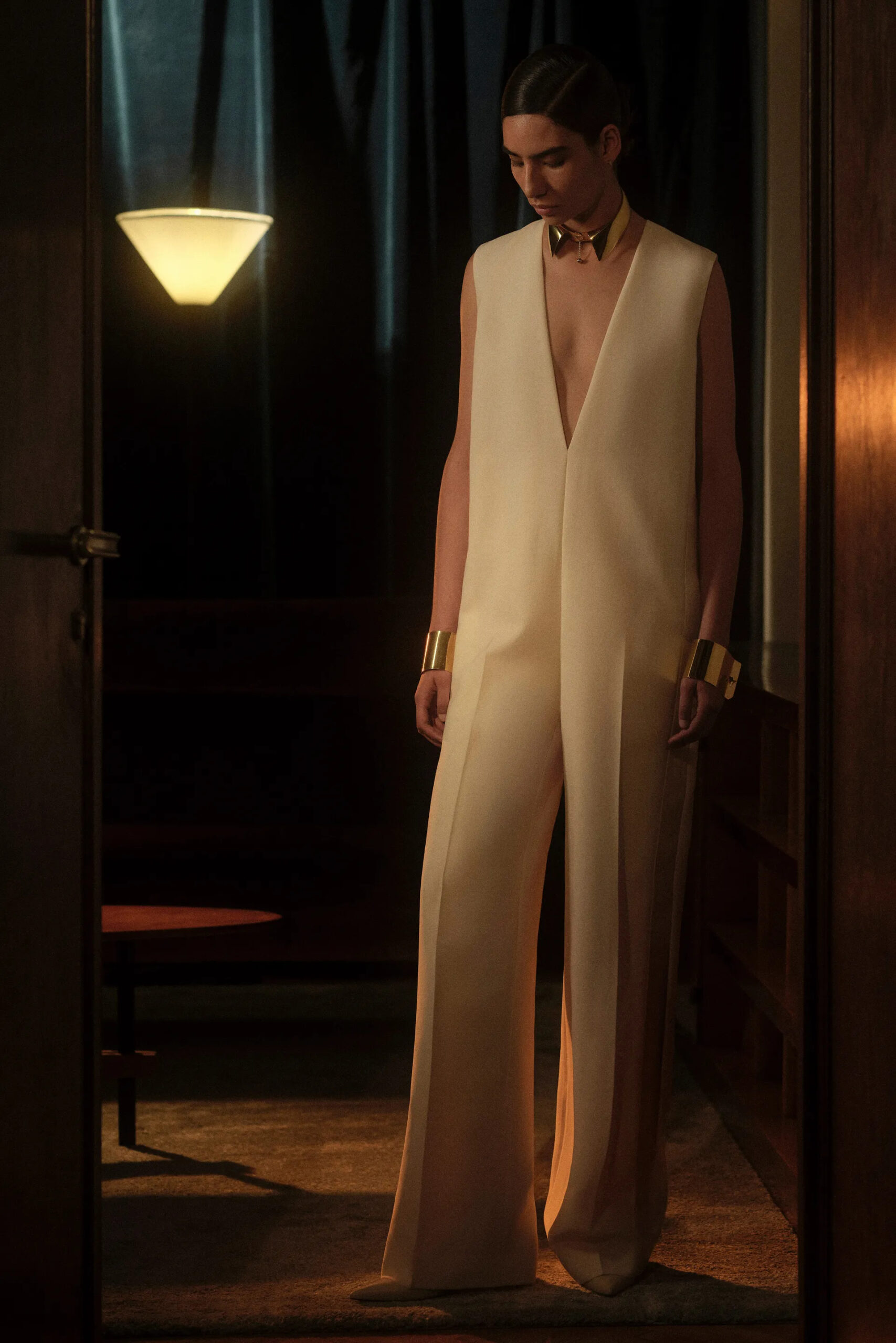 Sculptural ivory jumpsuit with deep neckline from the Fendi Resort 2027 collection