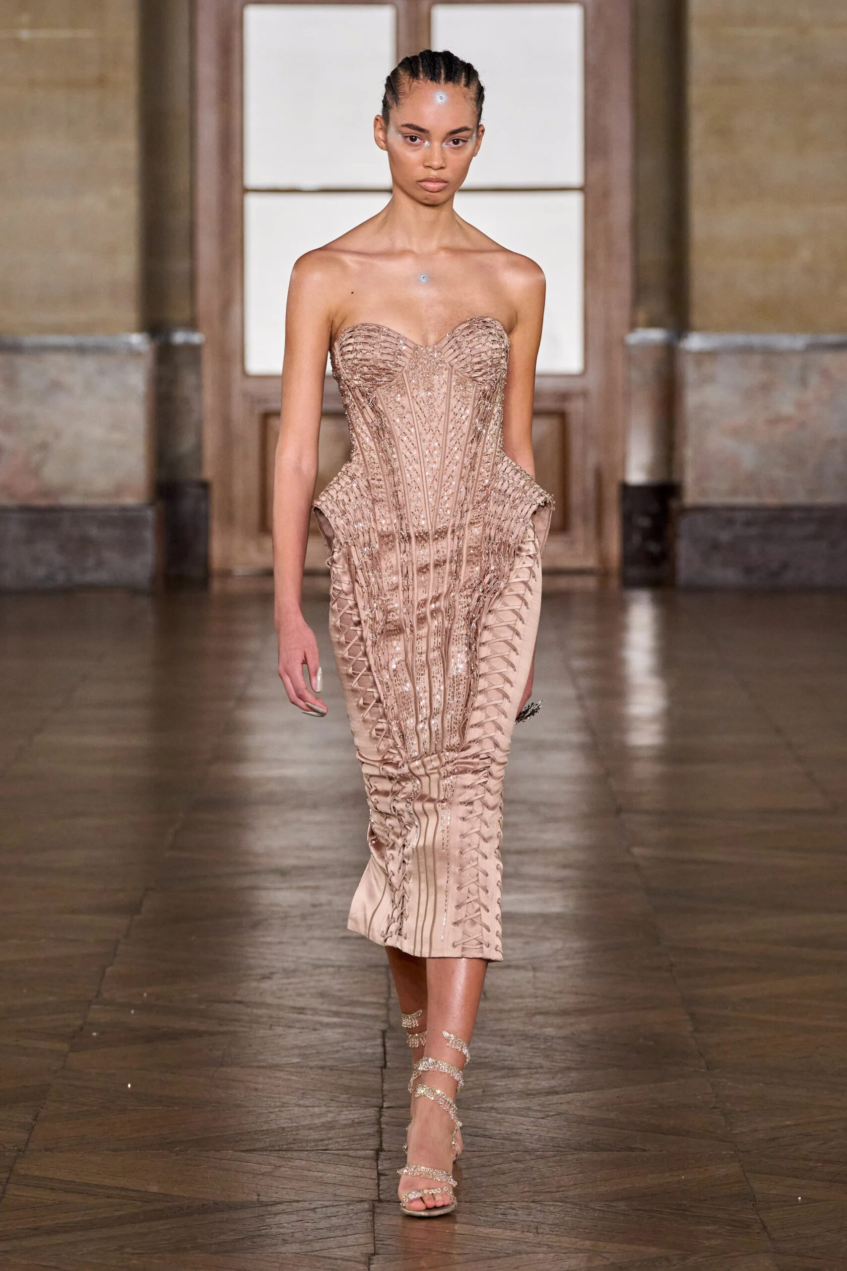 Nude embroidered corseted couture dress with crystal detailing from Gaurav Gupta Spring 2026 Couture