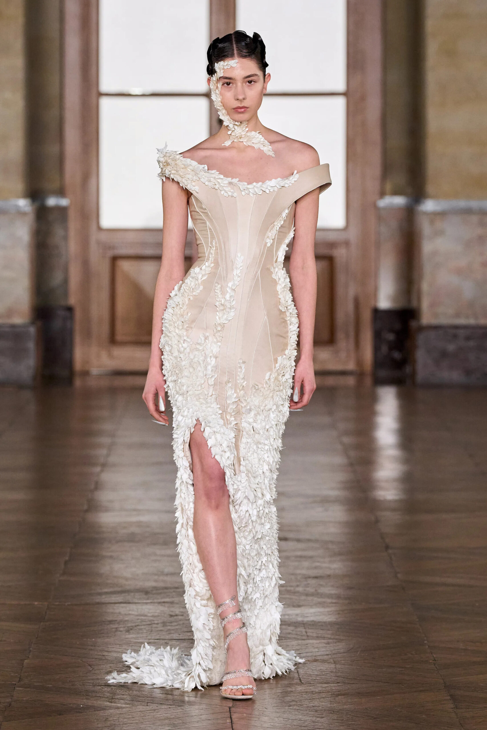 Ivory sculpted couture gown with floral appliqué detailing by Gaurav Gupta Spring 2026 Couture