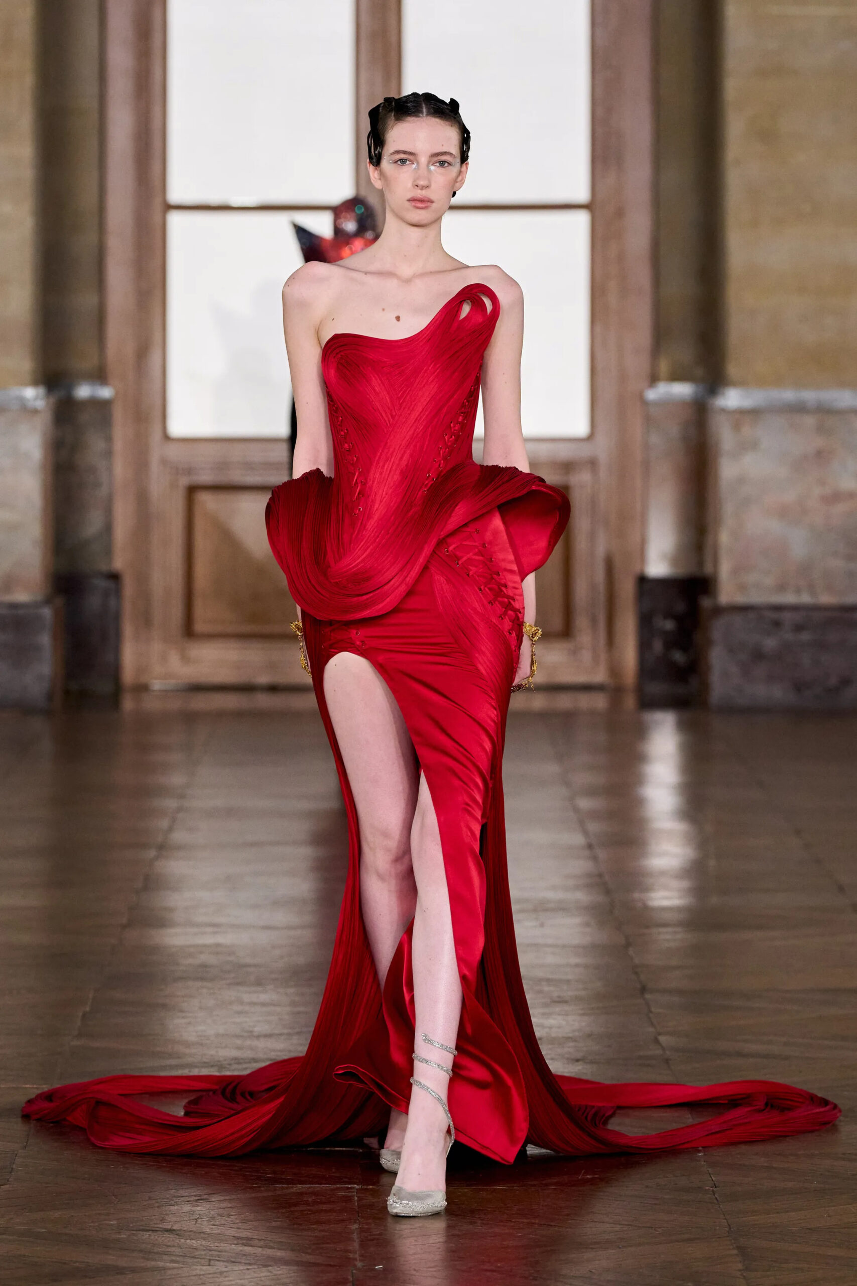 Red sculptural couture gown with dramatic draped structure by Gaurav Gupta Spring 2026 Couture