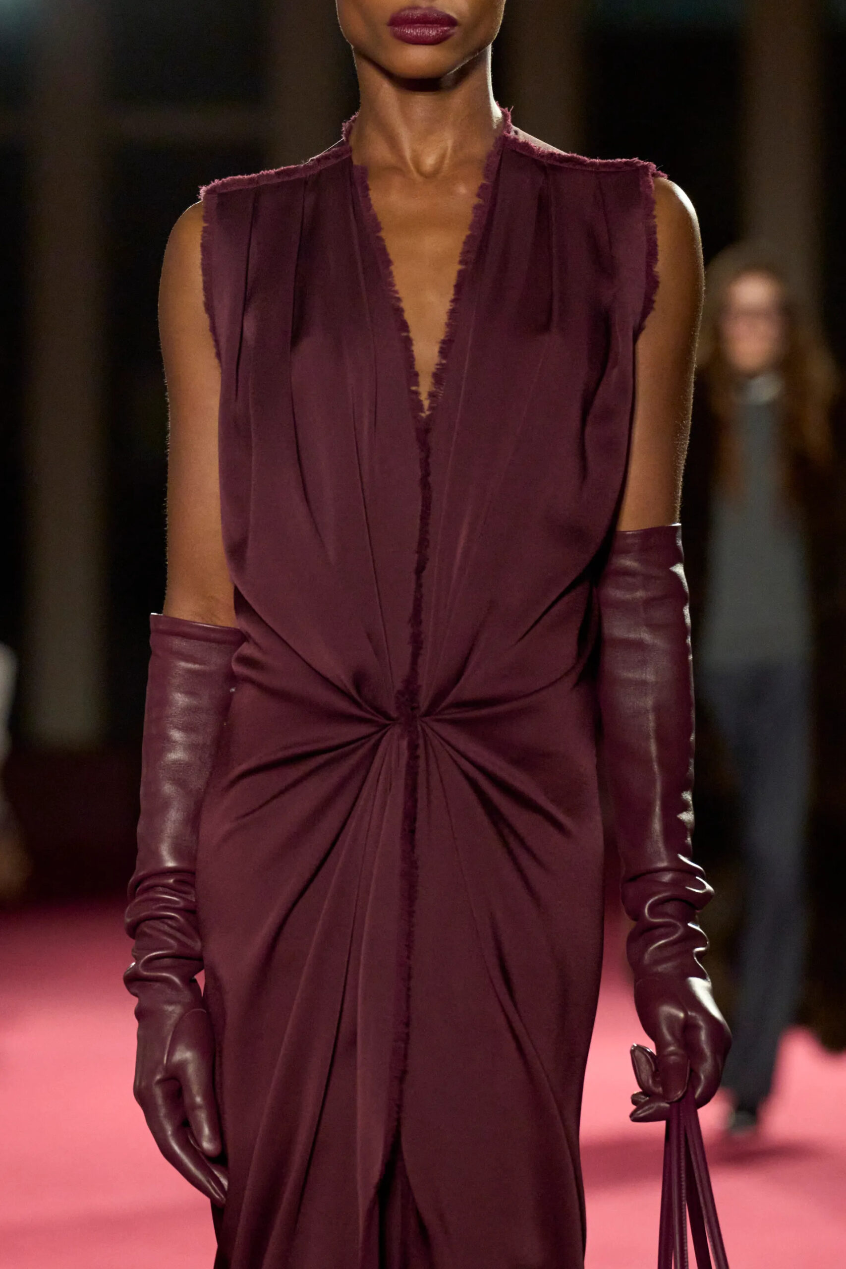 Michael Kors Collection burgundy opera gloves and draped eveningwear detail