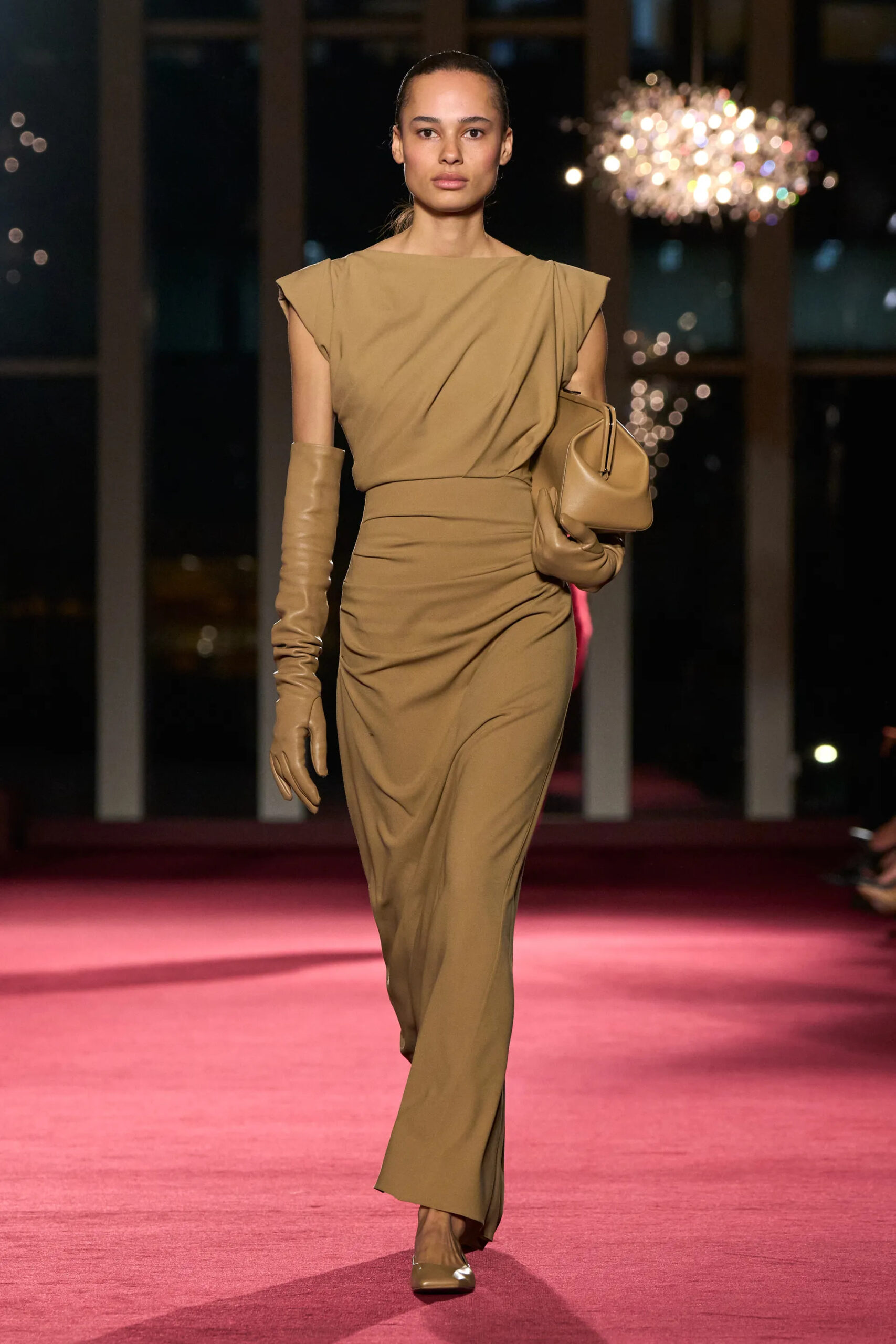 Michael Kors Collection camel draped evening look with gloves and clutch at New York Fashion Week