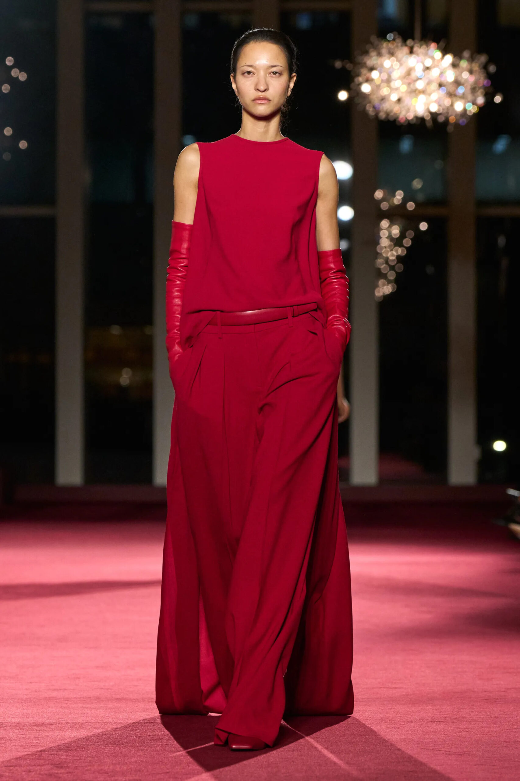 Michael Kors Collection red flowing evening runway look during Fall Winter 2026 show