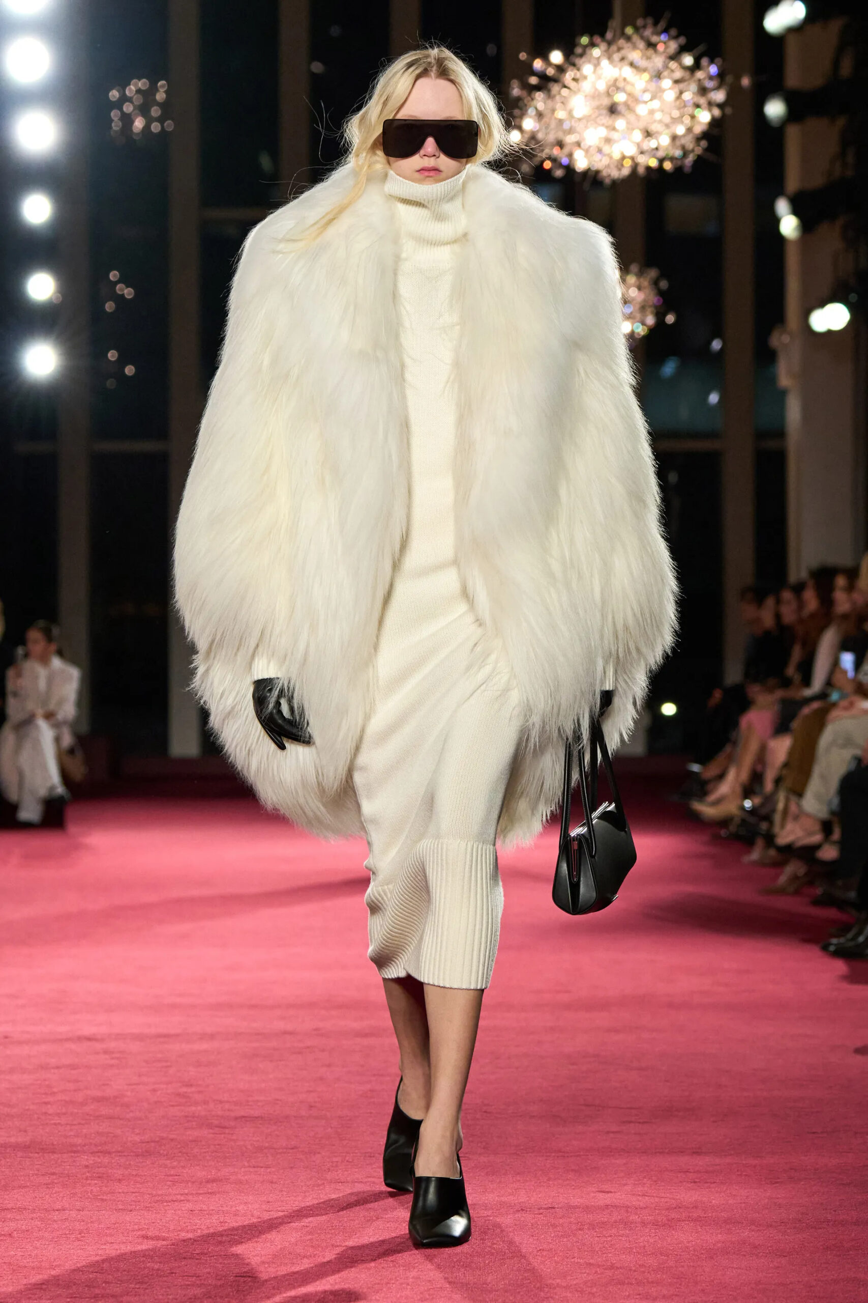 Michael Kors Collection ivory knit dress with oversized fur coat and sunglasses Fall Winter 2026