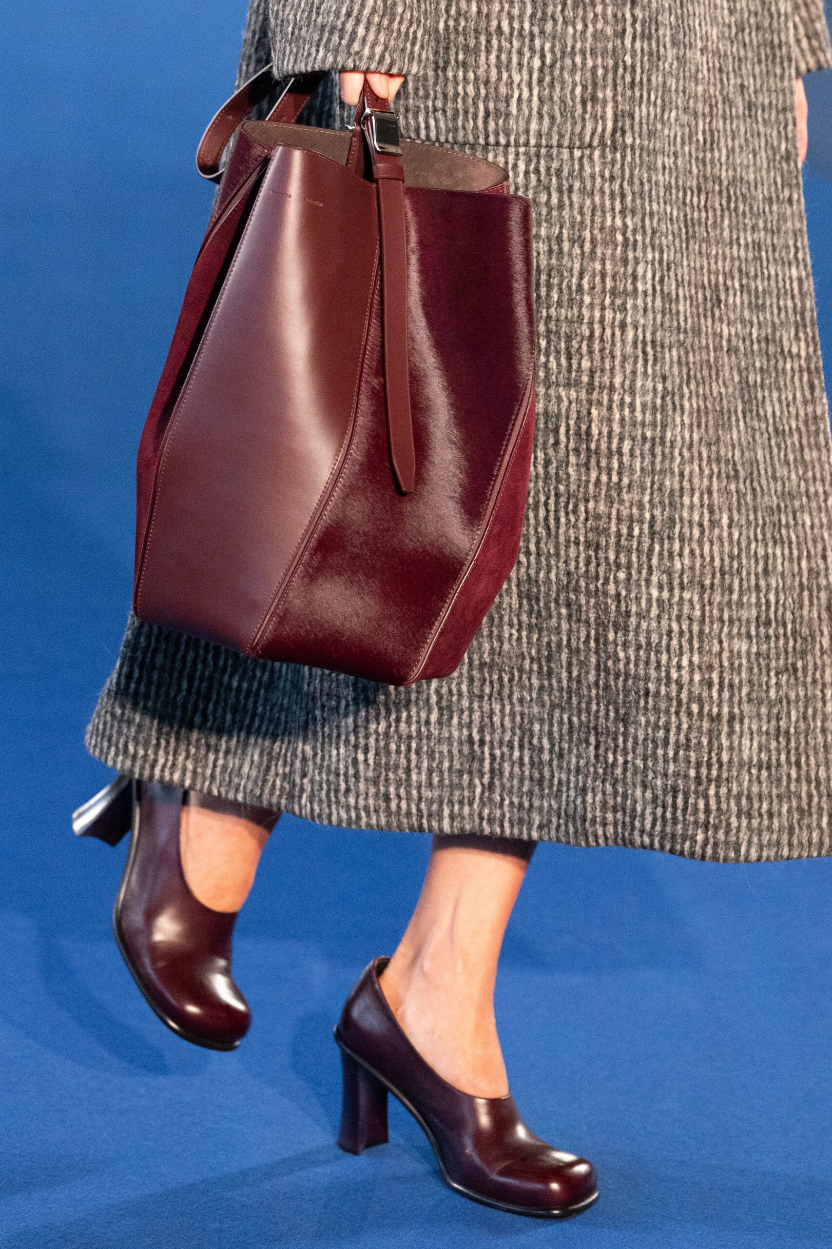 Burgundy leather tote and dark heels from Proenza Schouler Fall 2026 accessories