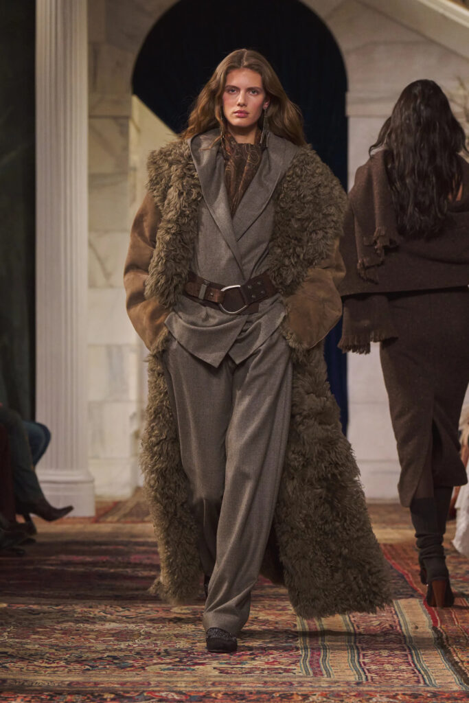 Ralph Lauren Fall Winter 2026 shearling coat layered over relaxed tailoring at New York Fashion Week