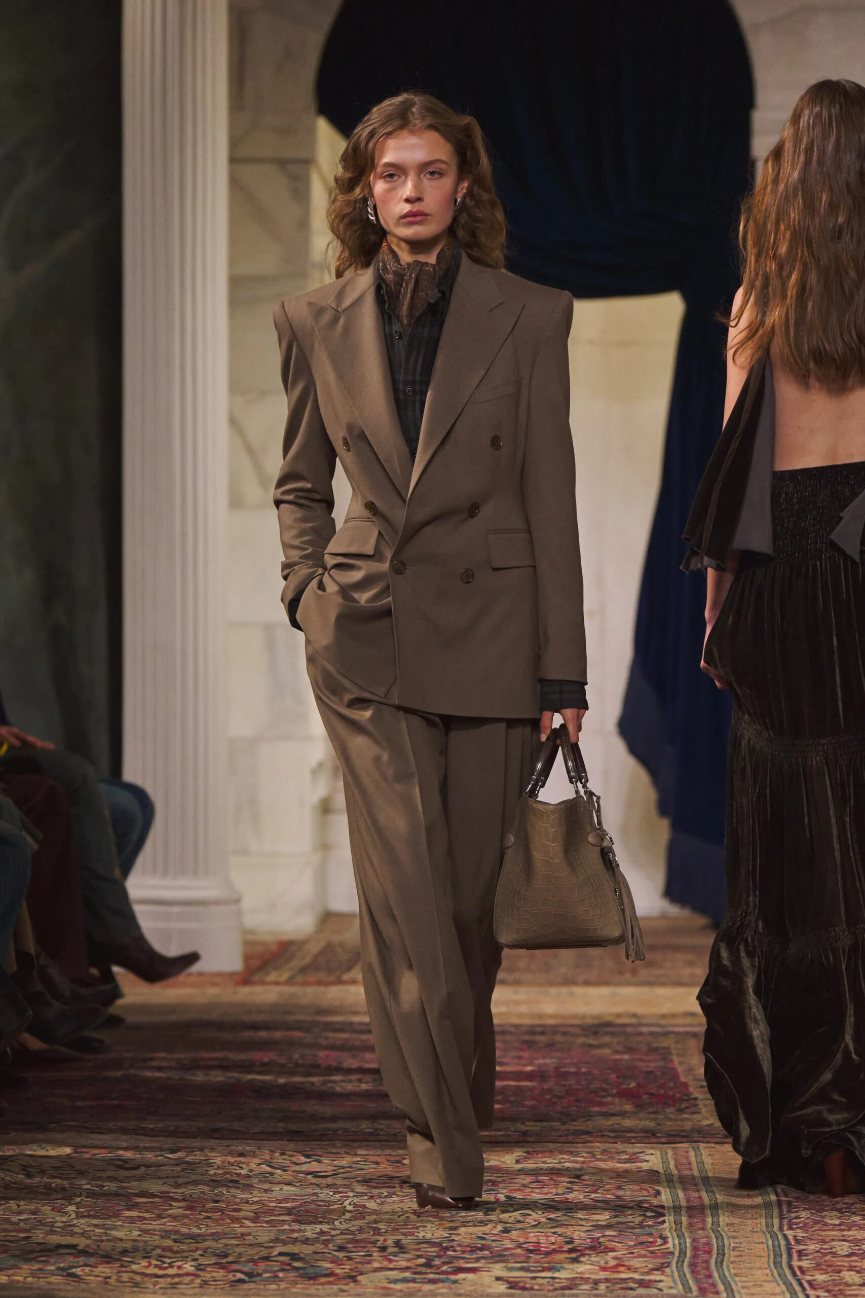Double-breasted brown suit with crocodile leather handbag at Ralph Lauren Fall Winter 2026
