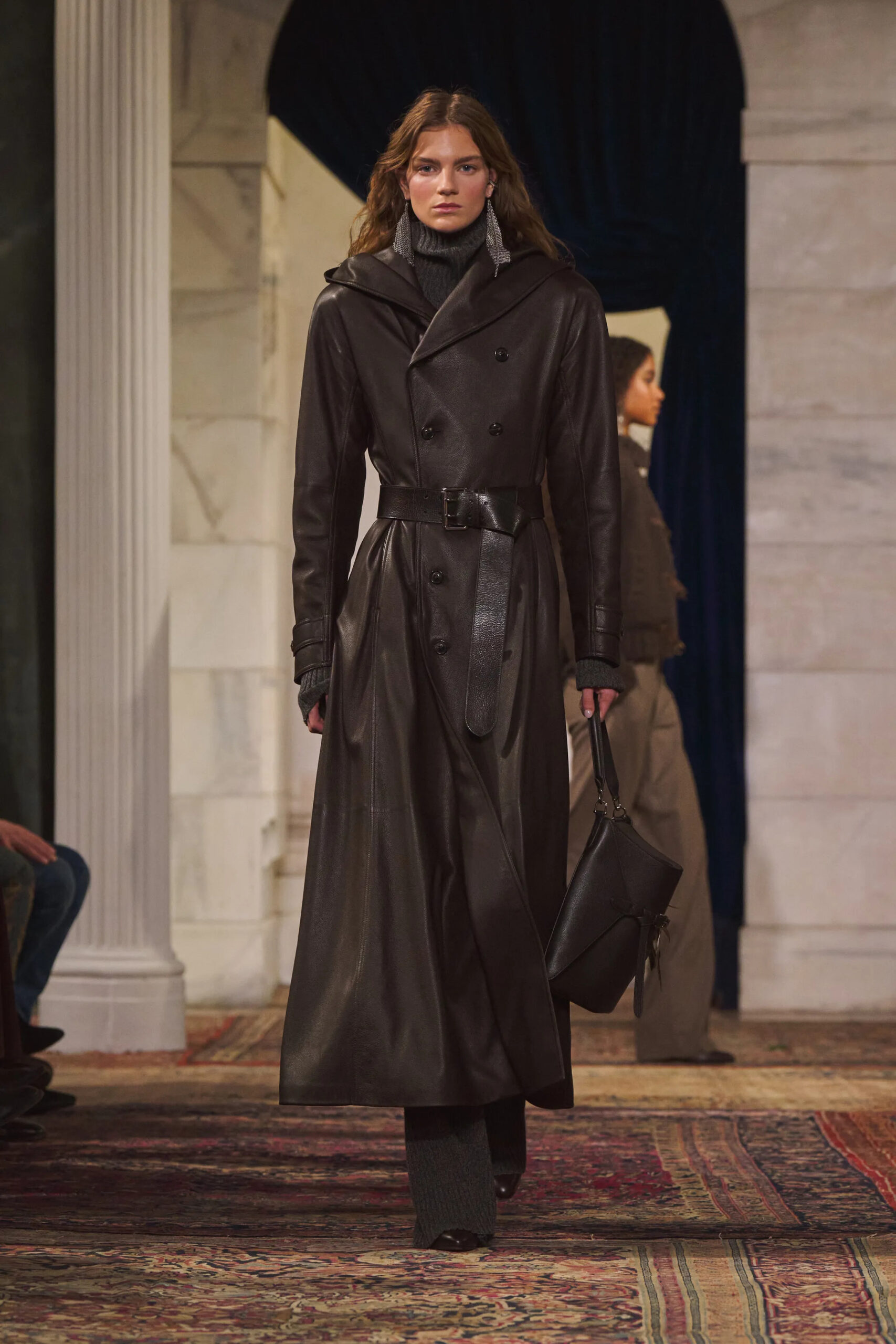 Dark leather trench coat with structured handbag from Ralph Lauren Fall Winter 2026