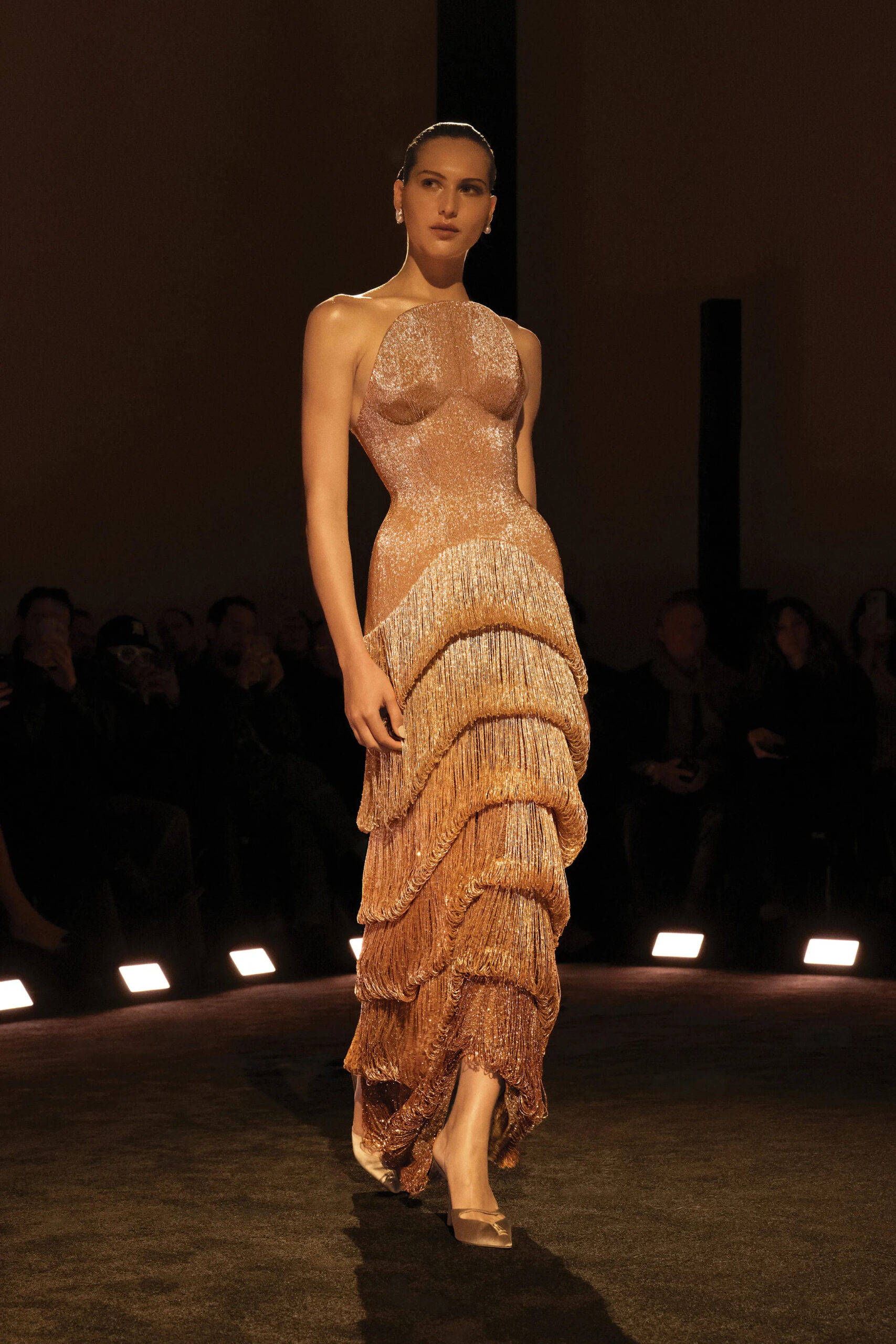 Rose gold Schiaparelli couture gown covered in layered crystal fringe during Spring 2026 Couture