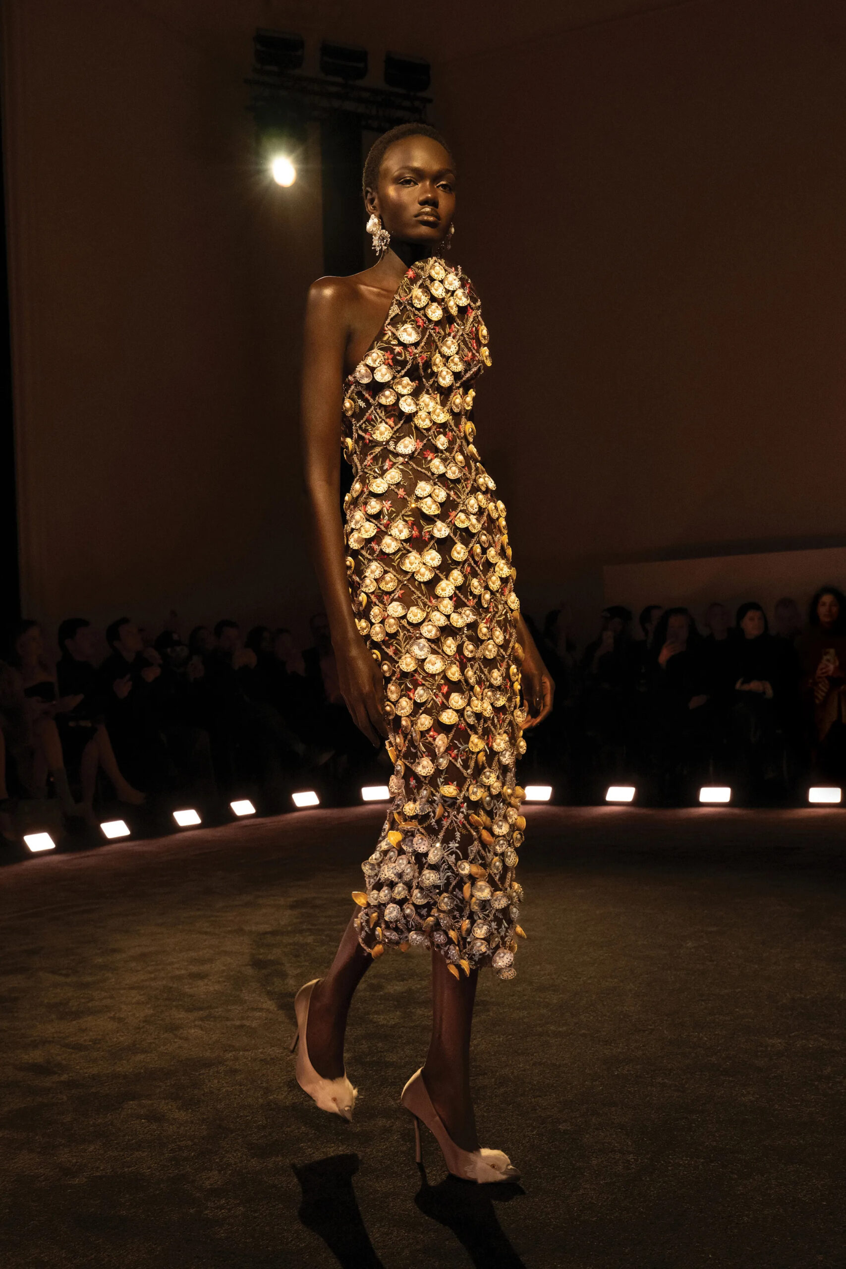 Schiaparelli couture dress embroidered with metallic coin embellishments and intricate beading
