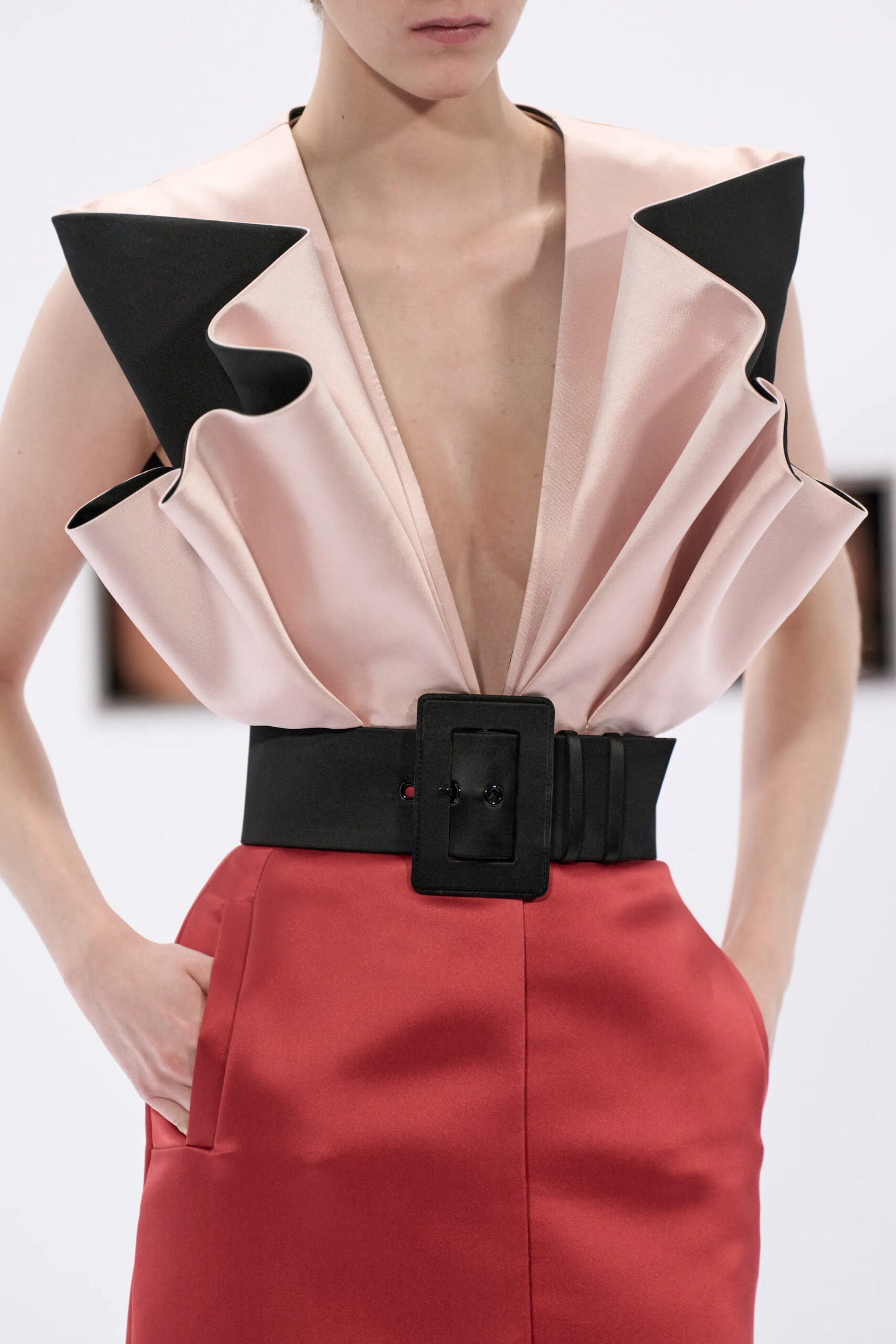 Close-up of Valentino Spring 2026 Couture sculptural pink and red satin look by Alessandro Michele