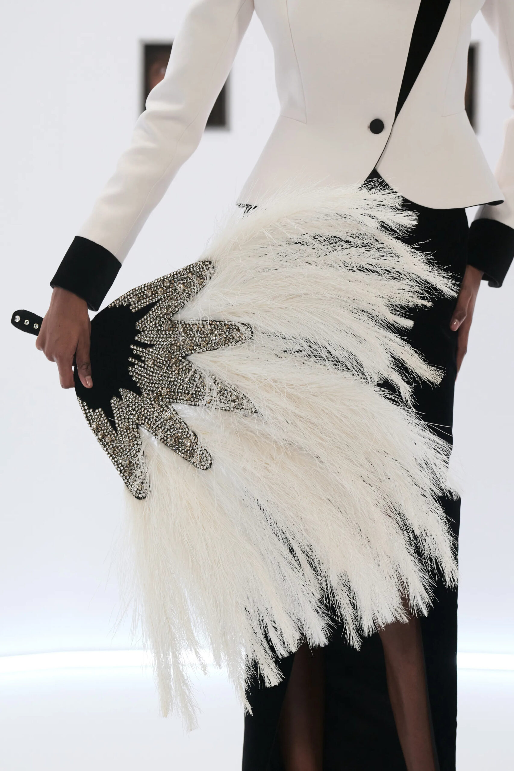 Feather embellished Valentino couture clutch Spring 2026