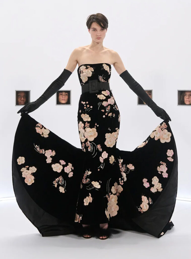 Black embroidered Valentino Spring 2026 Couture gown with dramatic side panels and opera gloves by Alessandro Michele