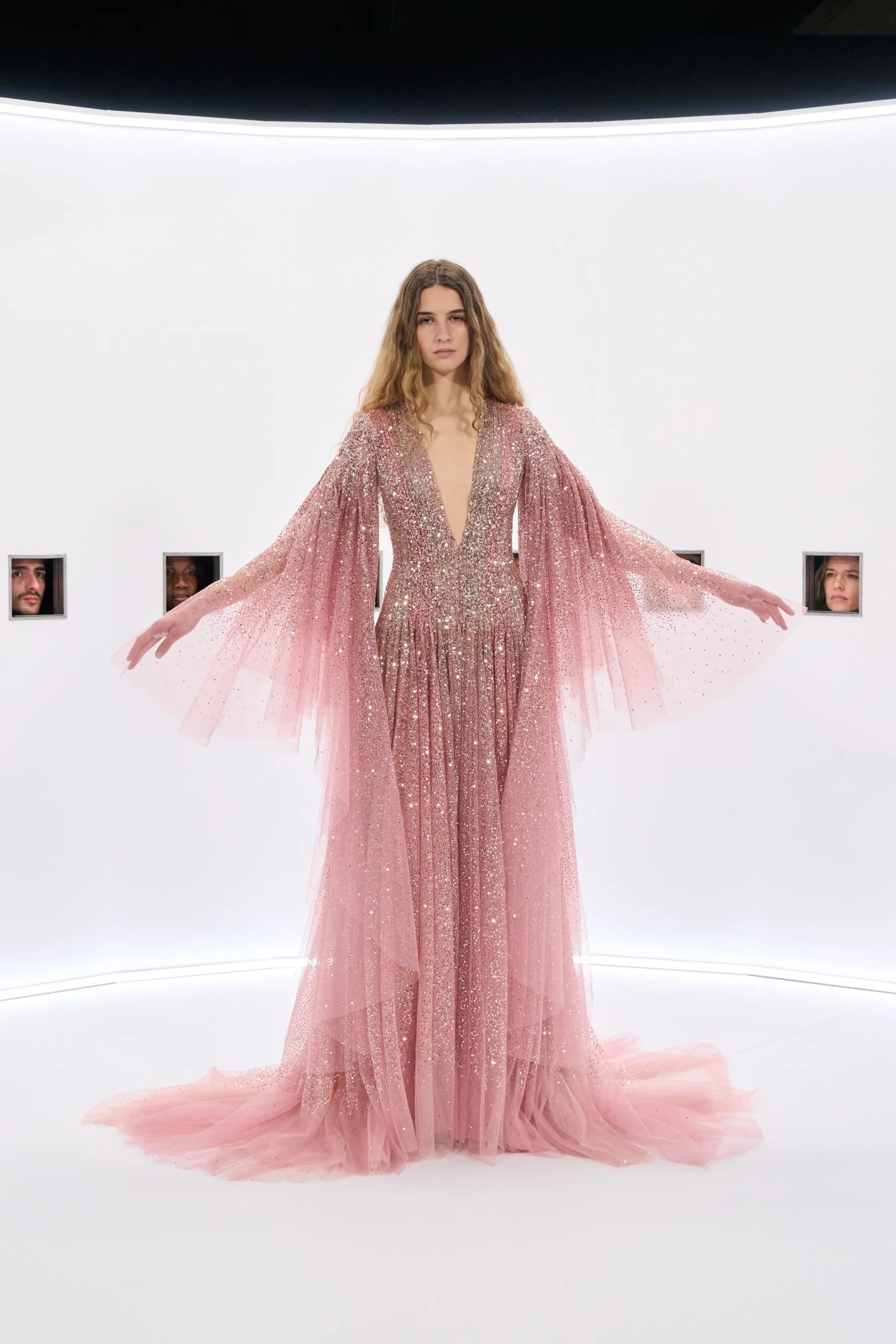 Pink sequined Valentino Spring 2026 Couture gown with flowing sleeves