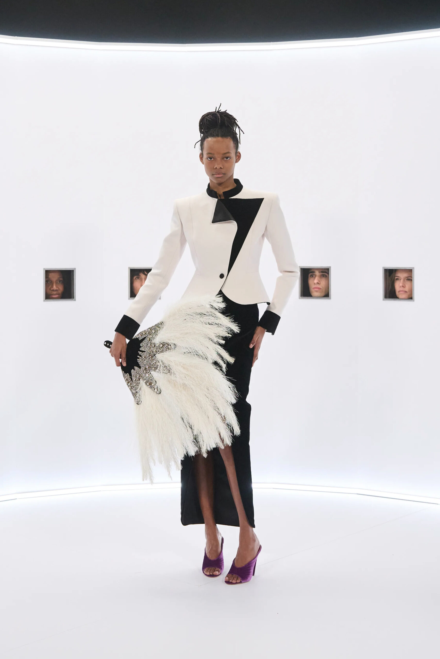 Black embellished Valentino couture look with feather headpiece Spring 2026