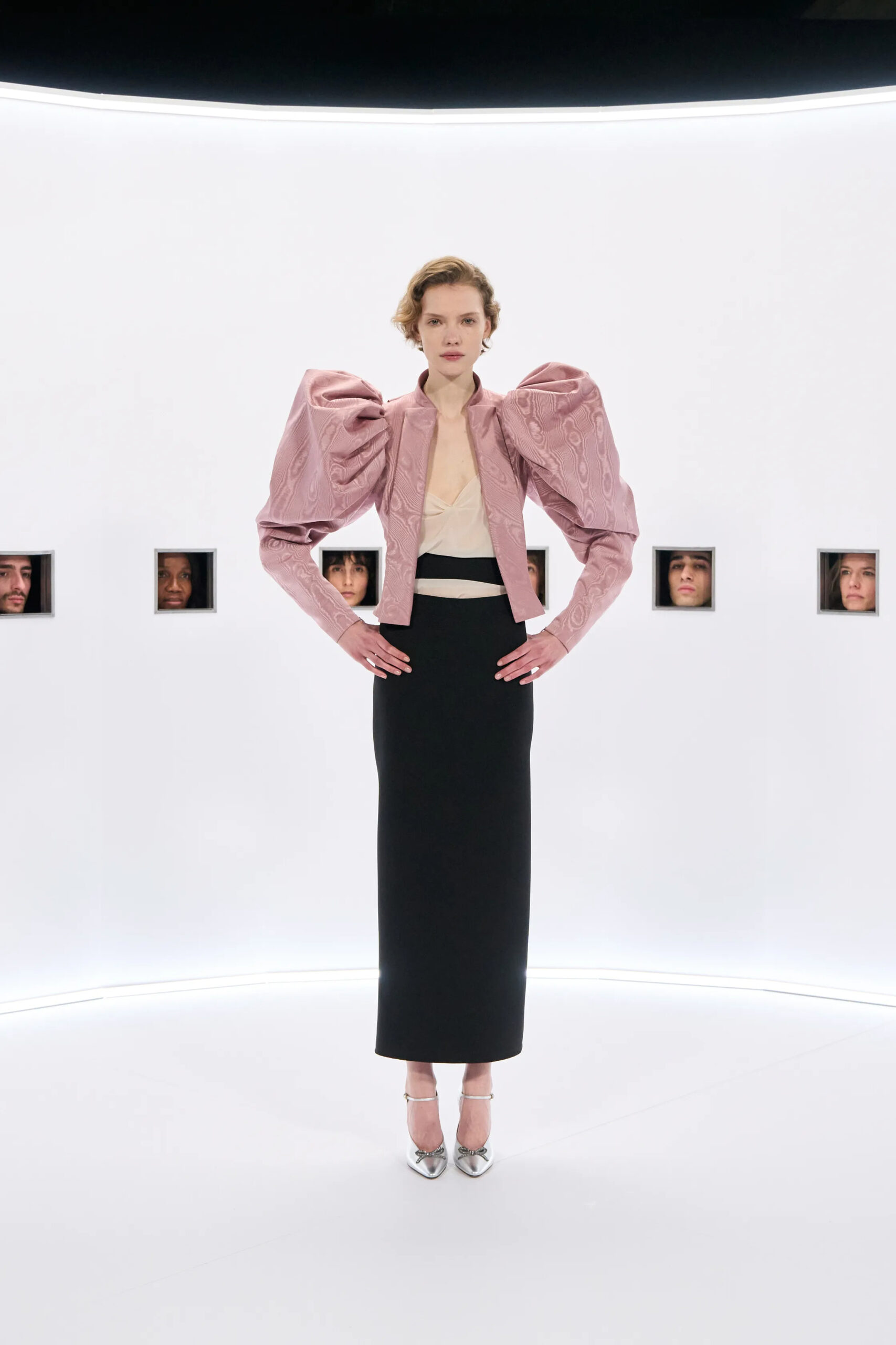 Pink sculptural Valentino couture jacket with black column skirt Spring 2026