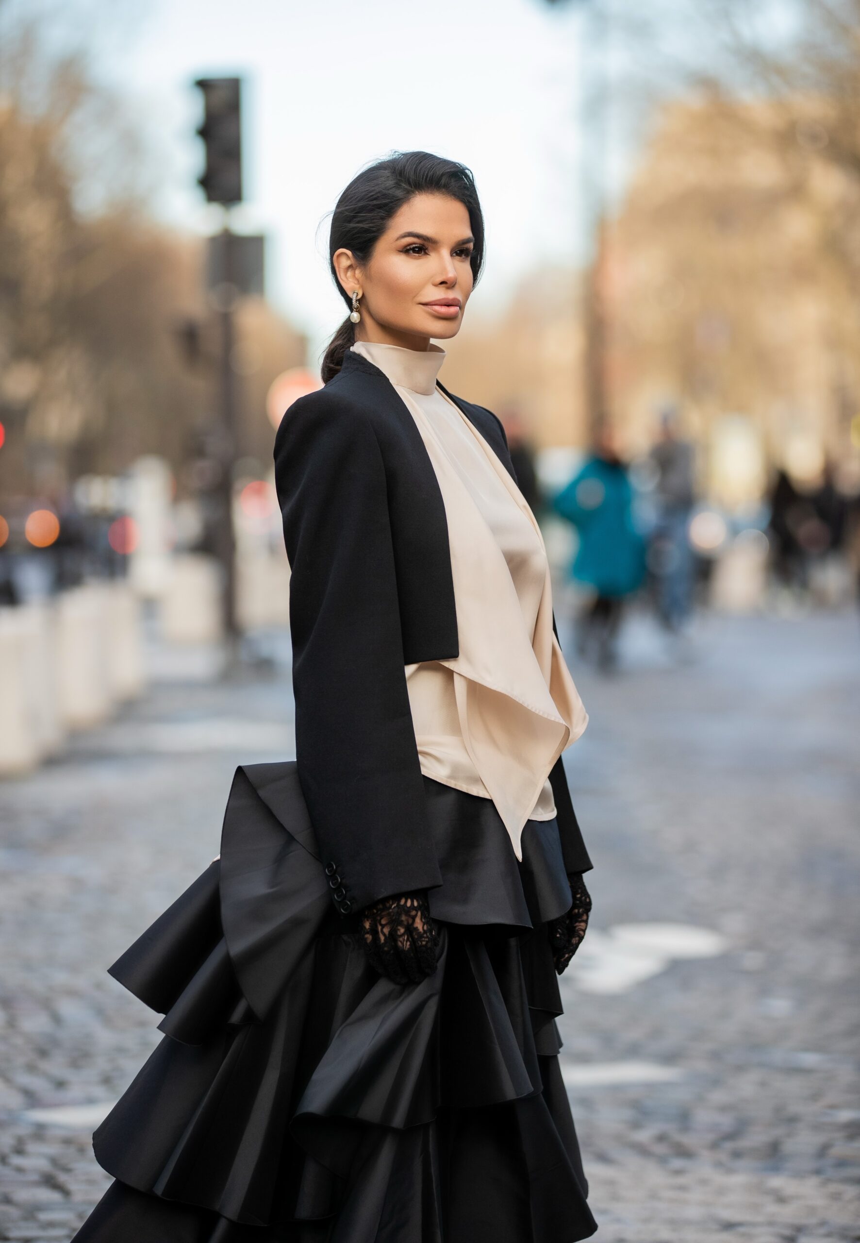 Portrait of Victoria Barbara wearing Dior earrings and Alexander McQueen during Paris Fashion Week.