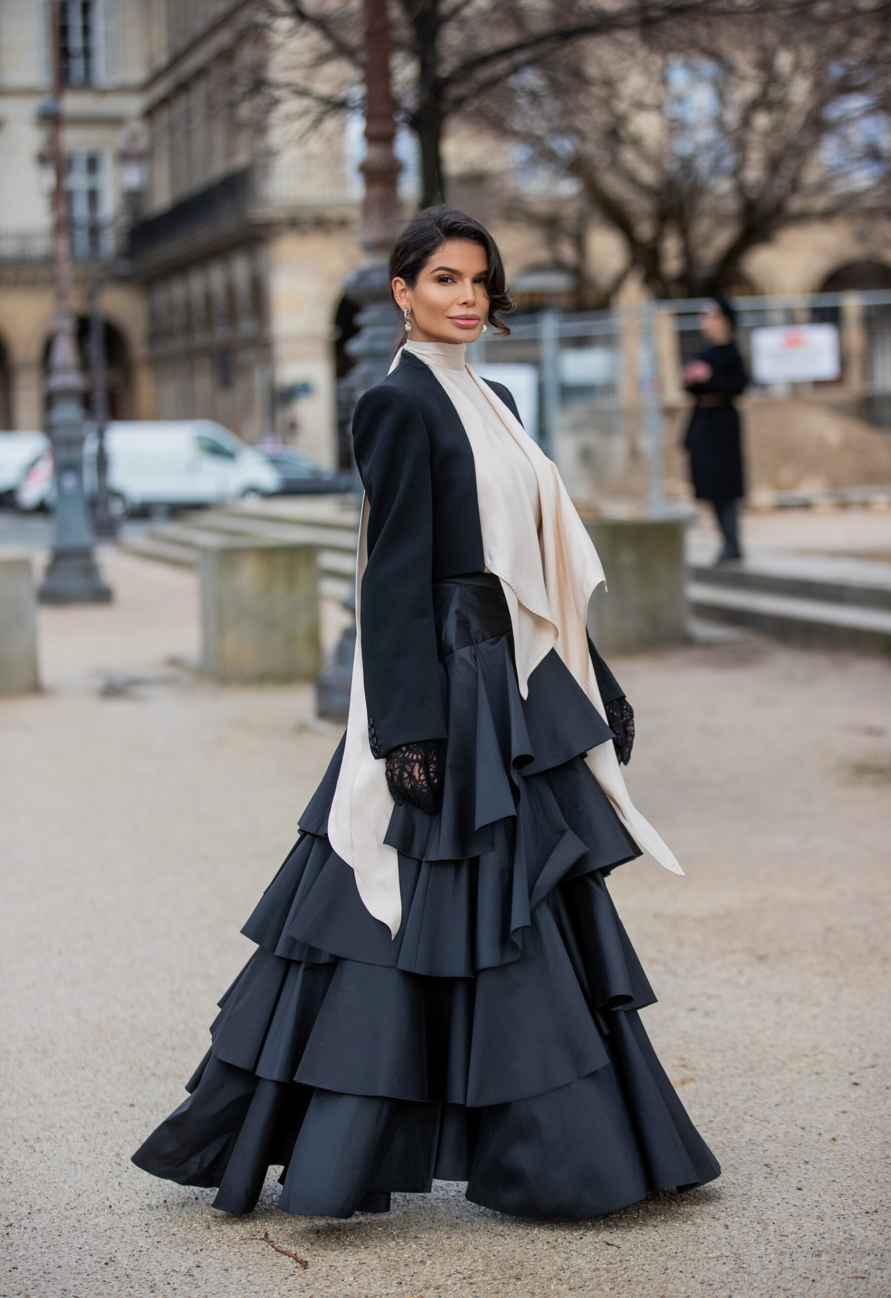 Victoria Barbara photographed in Giambattista Valli and Alexander McQueen on the streets of Paris during Fashion Week.