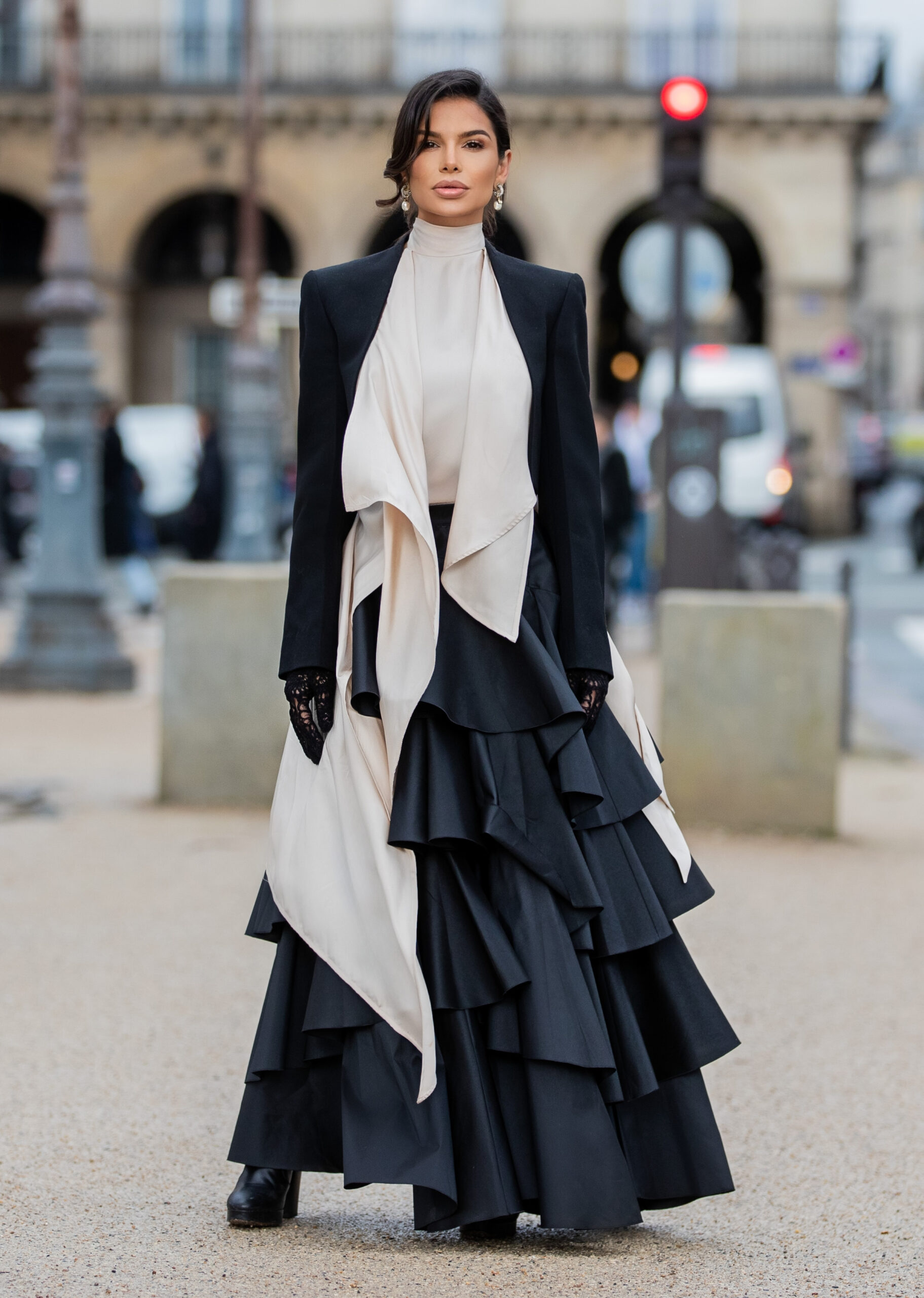 Victoria Barbara wearing Alexander McQueen and Giambattista Valli during Paris Fashion Week in Paris.