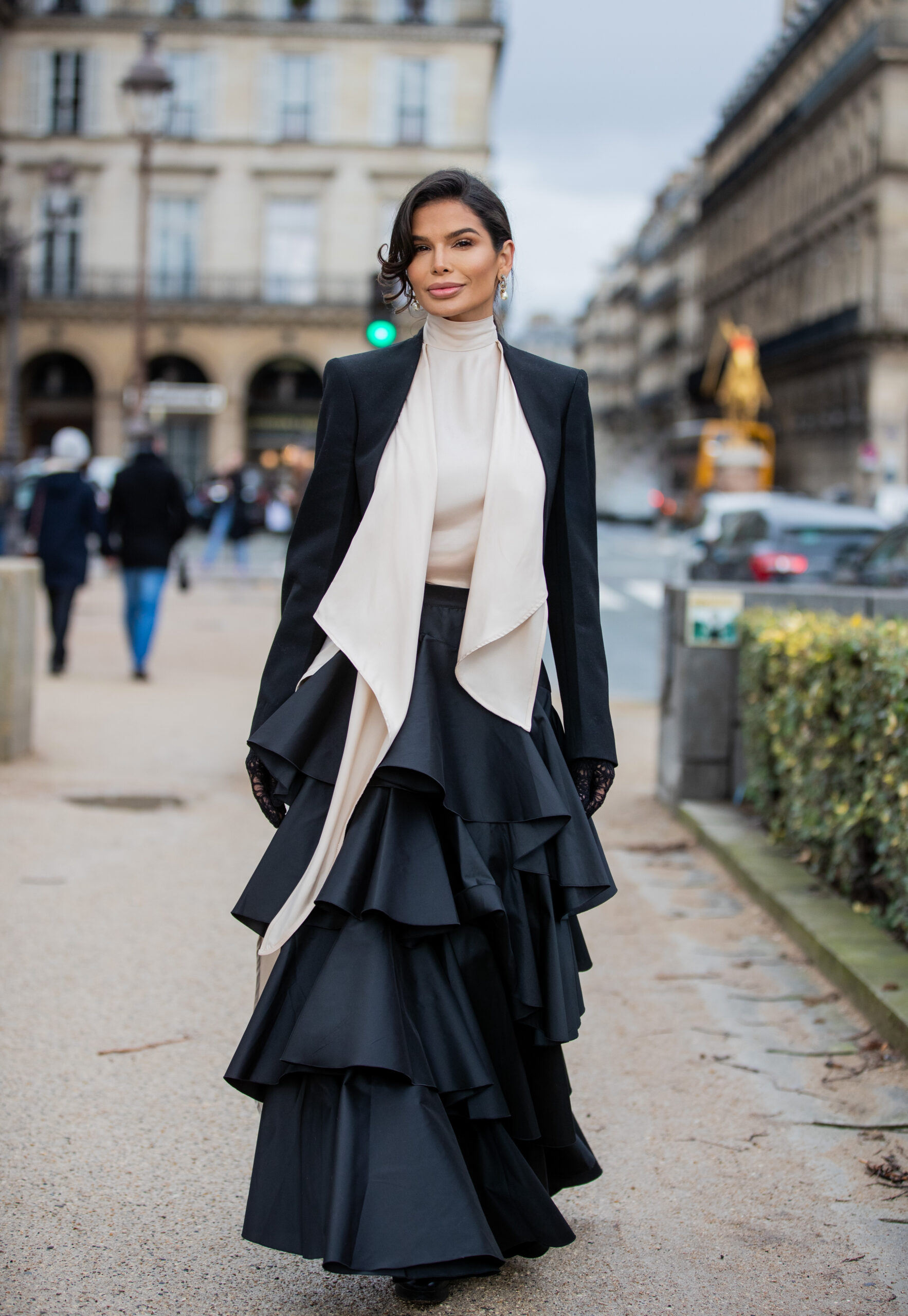 Victoria Barbara wearing a Giambattista Valli skirt and Alexander McQueen top before the Giambattista Valli show during Paris Fashion Week.