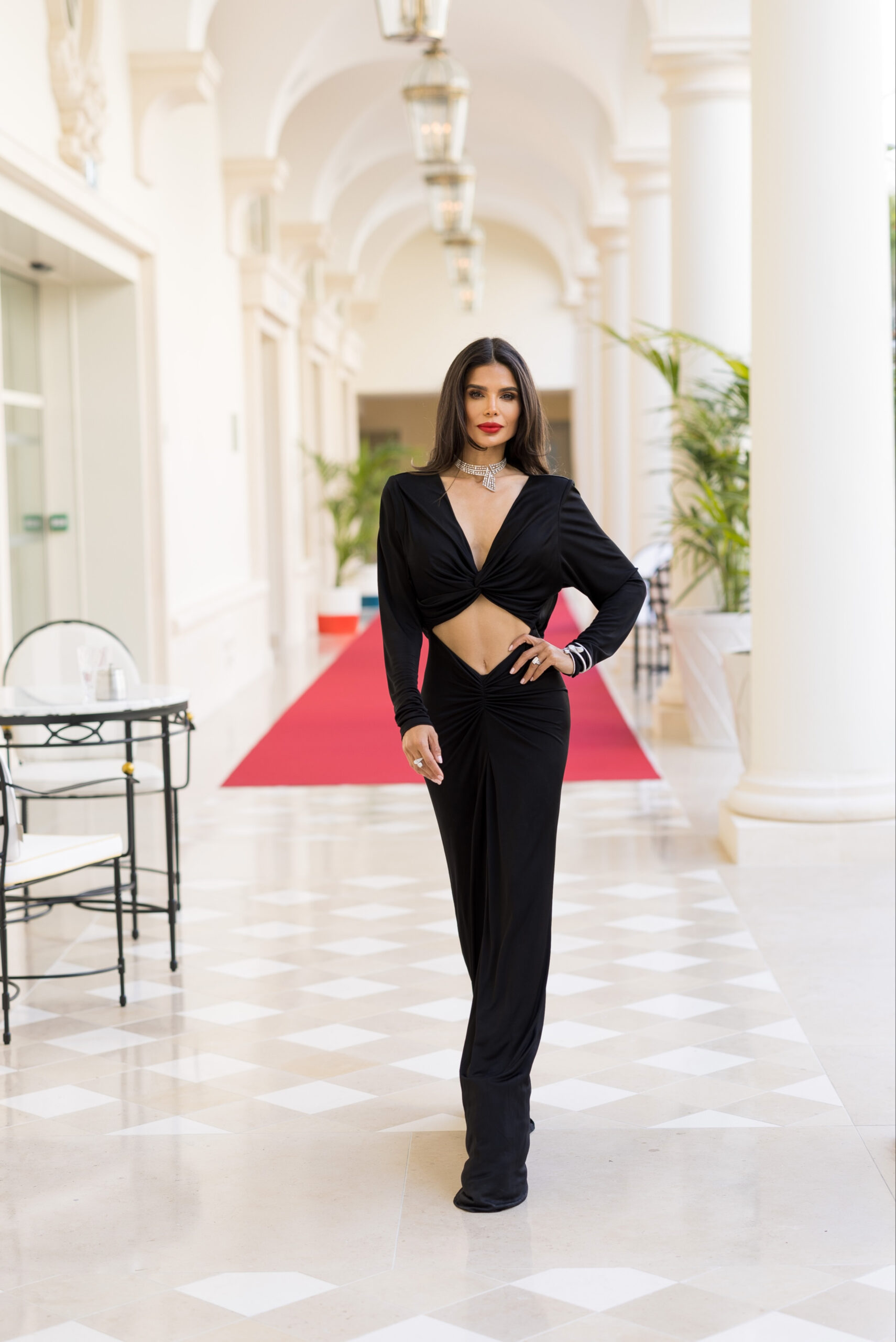 Victoria Barbara wearing a black Saint Laurent gown inside Hotel Martinez during Cannes Film Festival