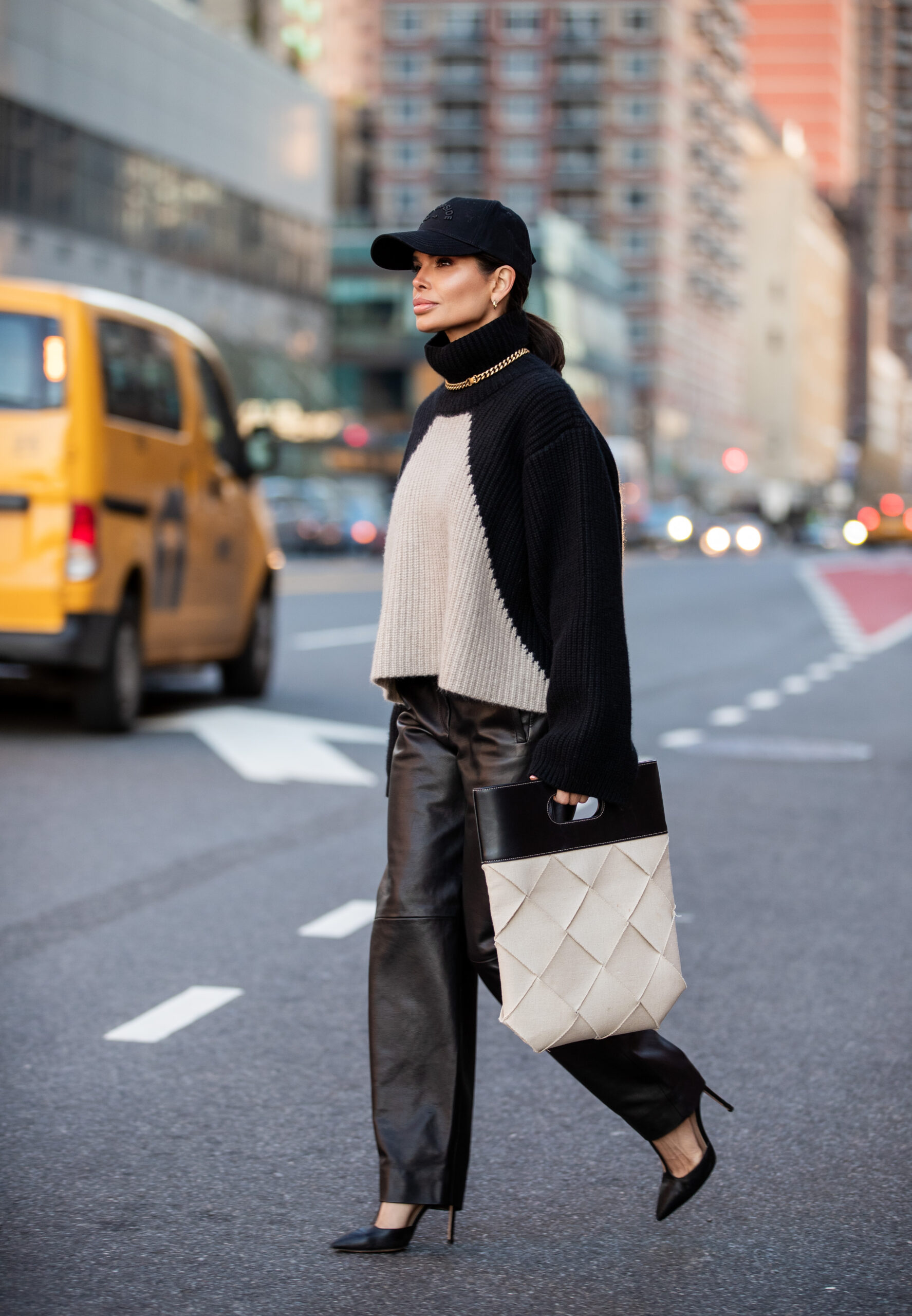 Victoria Barbara crossing a New York street wearing KHAITE, Dior, Bottega Veneta and Gianvito Rossi.