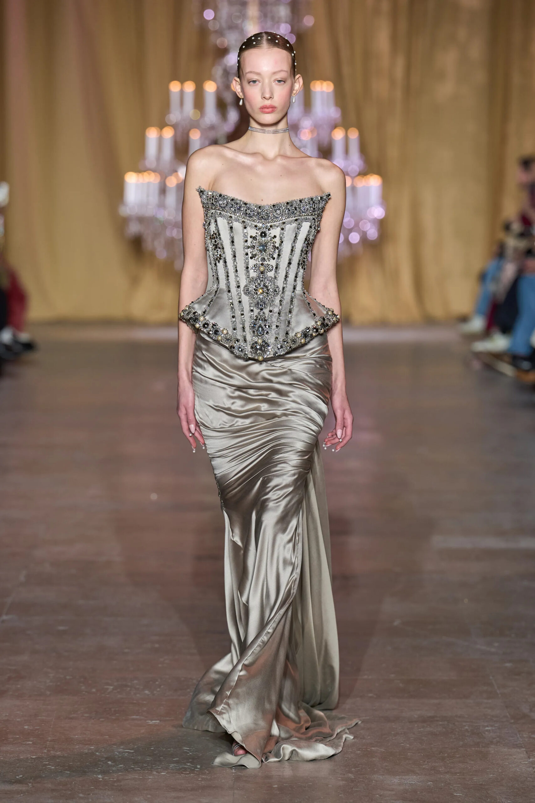 Model walking in Zuhair Murad Spring 2026 Couture wearing a silver embellished corset with a liquid satin skirt