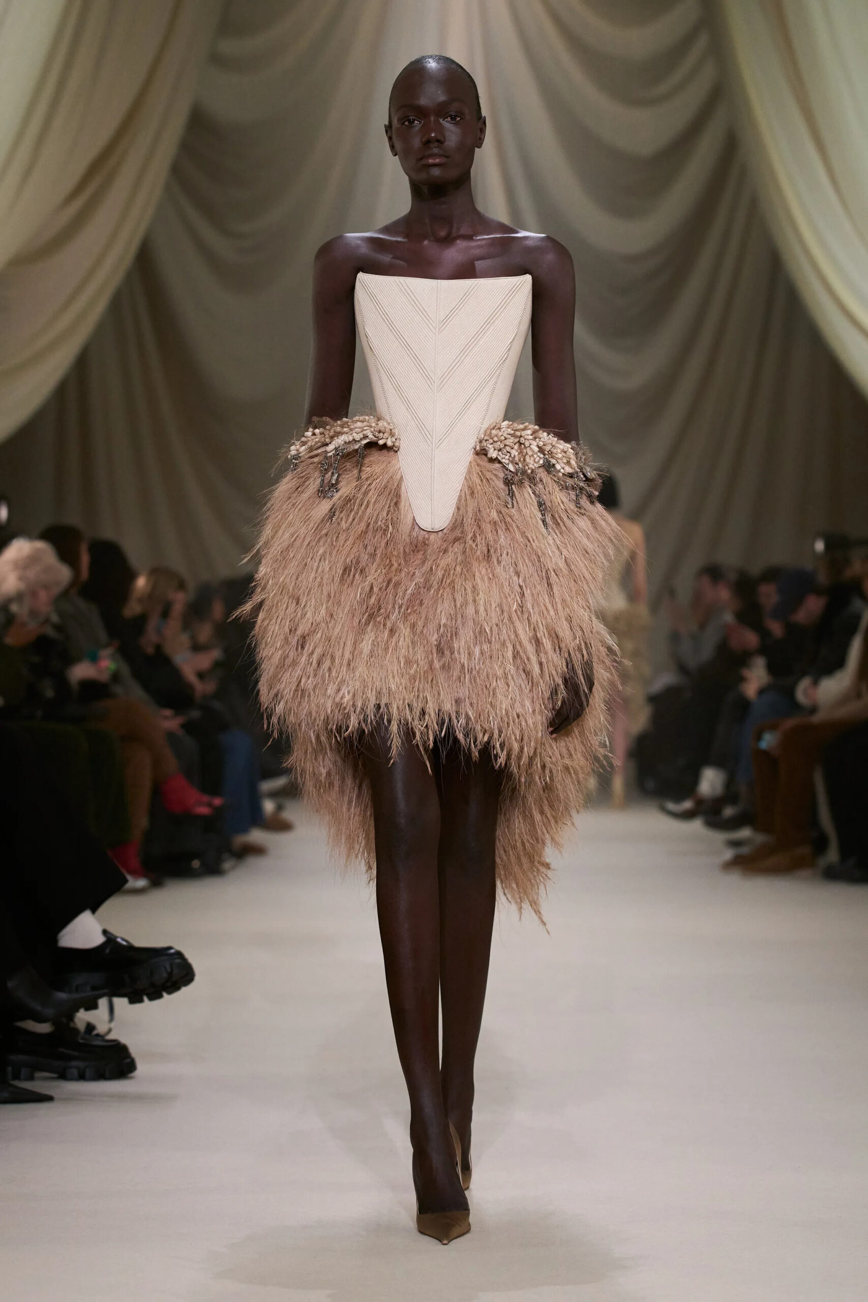Ashi Studio Spring 2026 Couture geometric ivory bodice with dramatic feathered skirt.