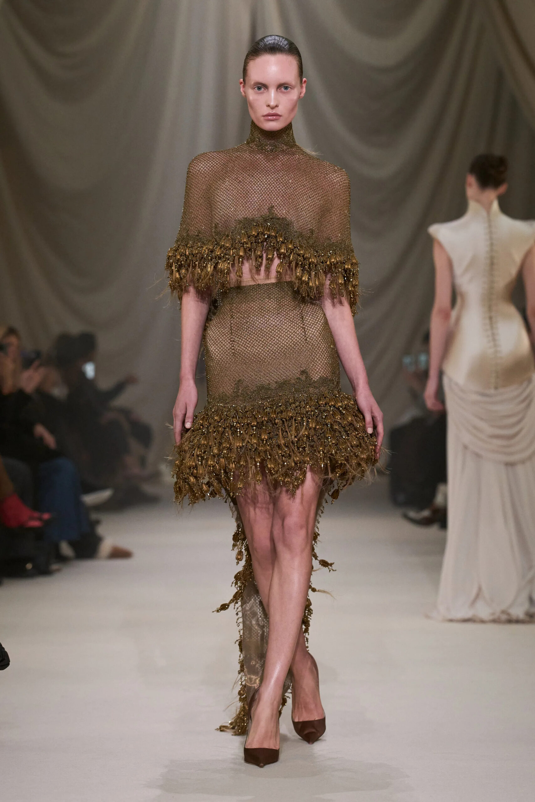 Ashi Studio Spring 2026 Couture olive beaded mesh dress finished with elaborate fringe embellishment.